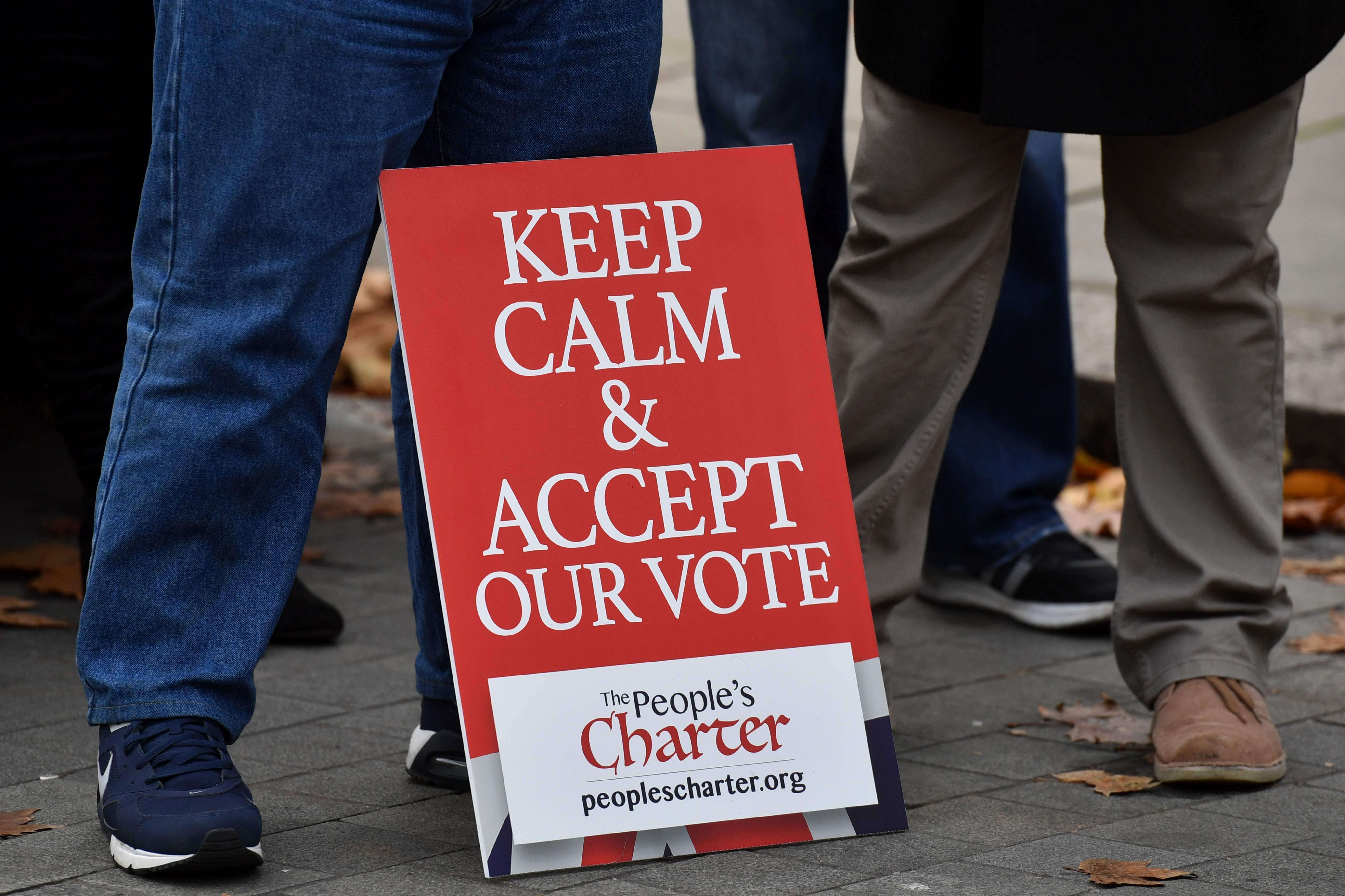 A poster from pro-Brexit group People’s Charter makes the sentiment clear as protesters gather at an anti-EU demonstration outside the Houses of Parliament in London, on November 23. Photo: AFP