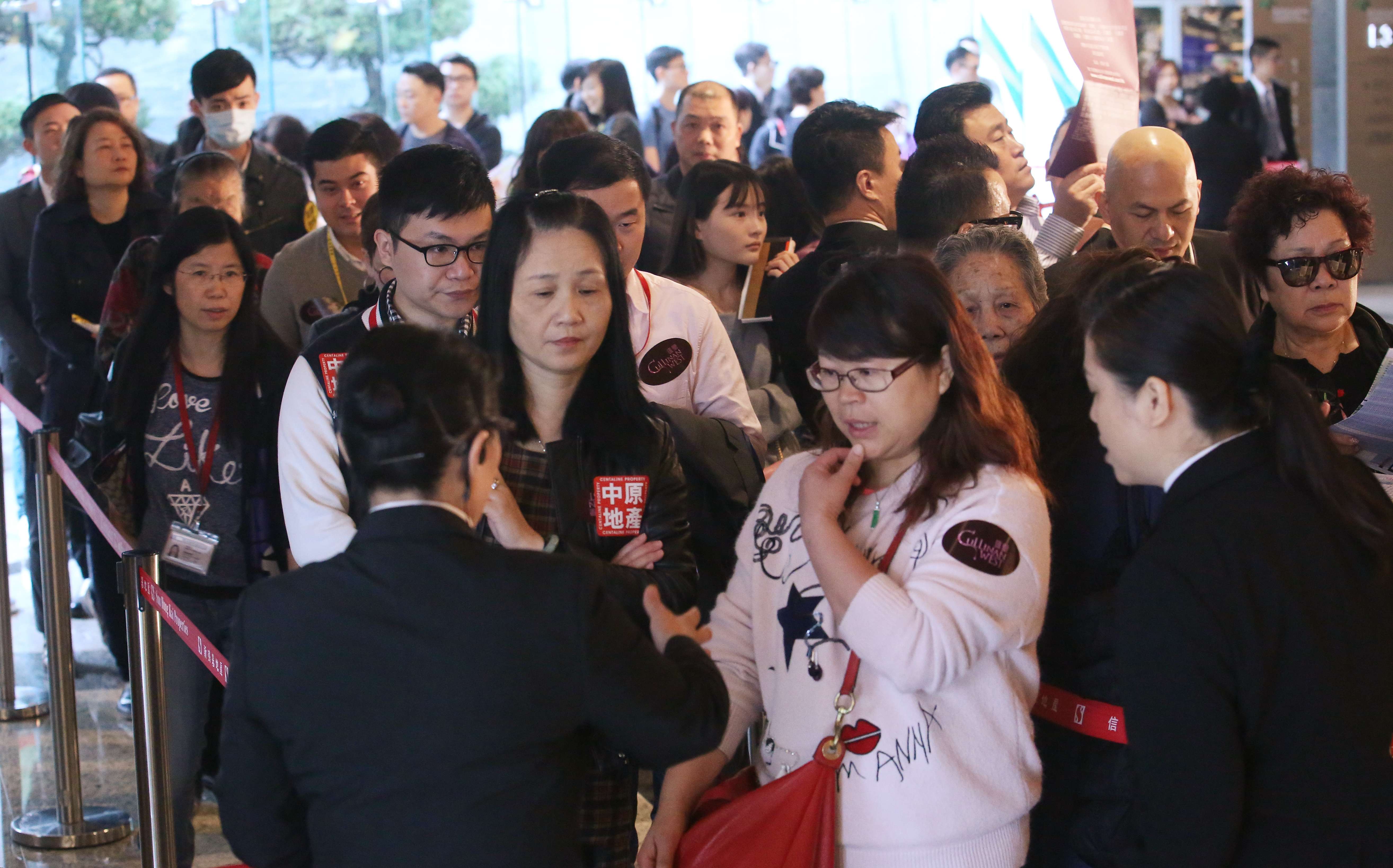 Potential buyers thronged the sales office of the Cullinan West apartments. Sun Hung Kai Properties, the developer, sold more than 80 per cent of the 309 units on offer on Saturday. Photo: Edward Wong