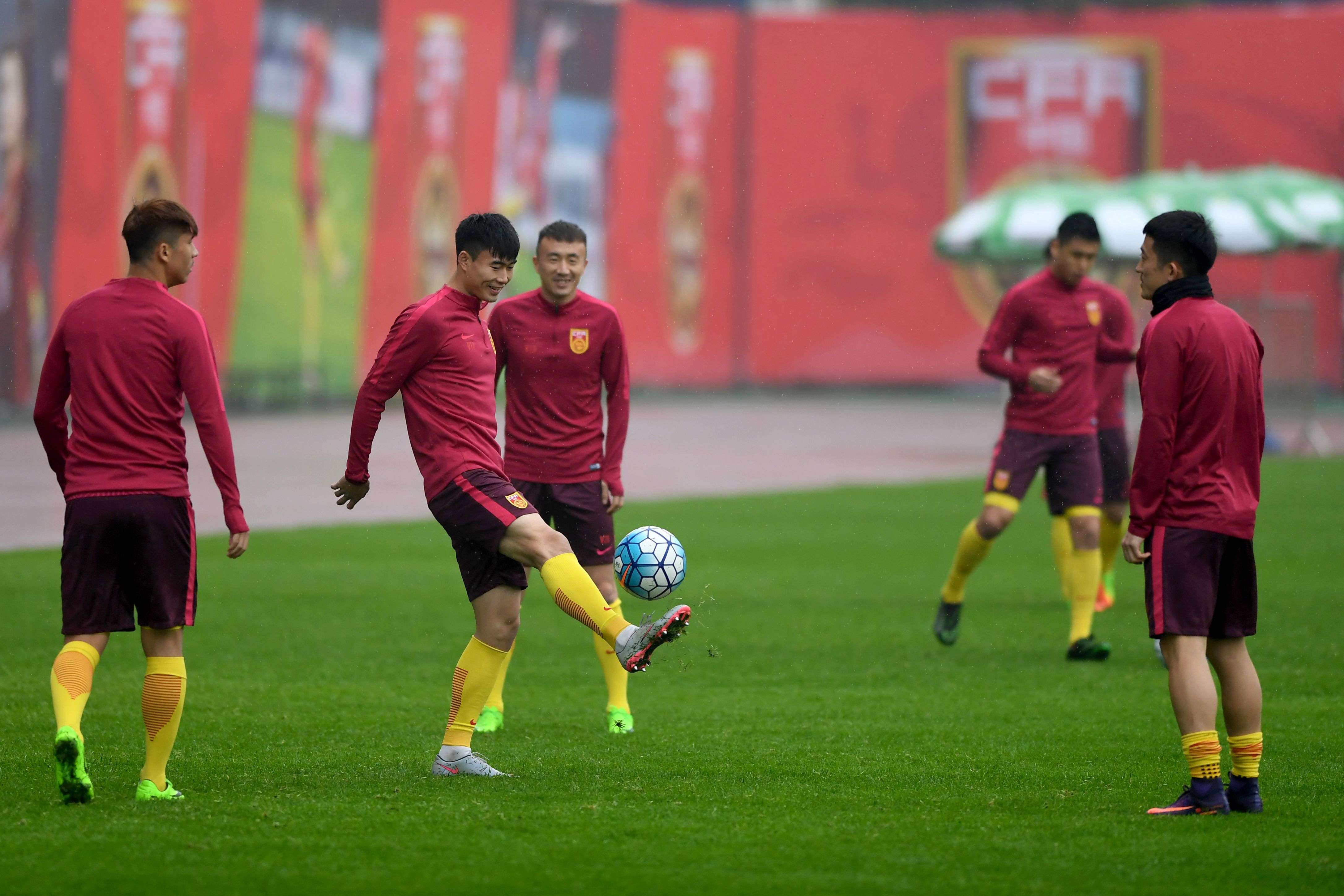Members of China's national team take part in a training session for the upcoming World Cup qualifier football match against South Korea in Changsha. Photo: AFP