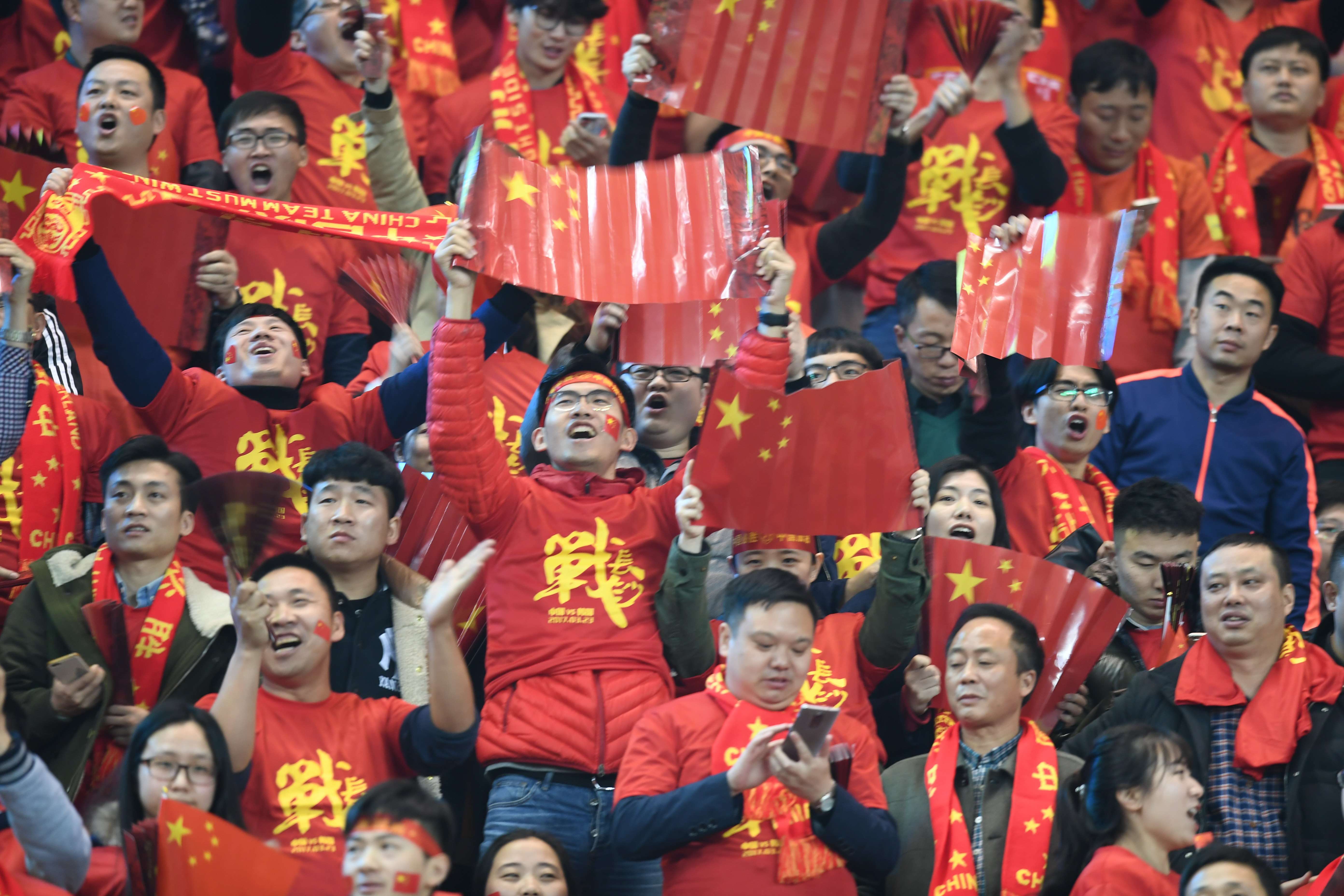 Chinese fans cheer on their team in Changsha. Photo: EPA