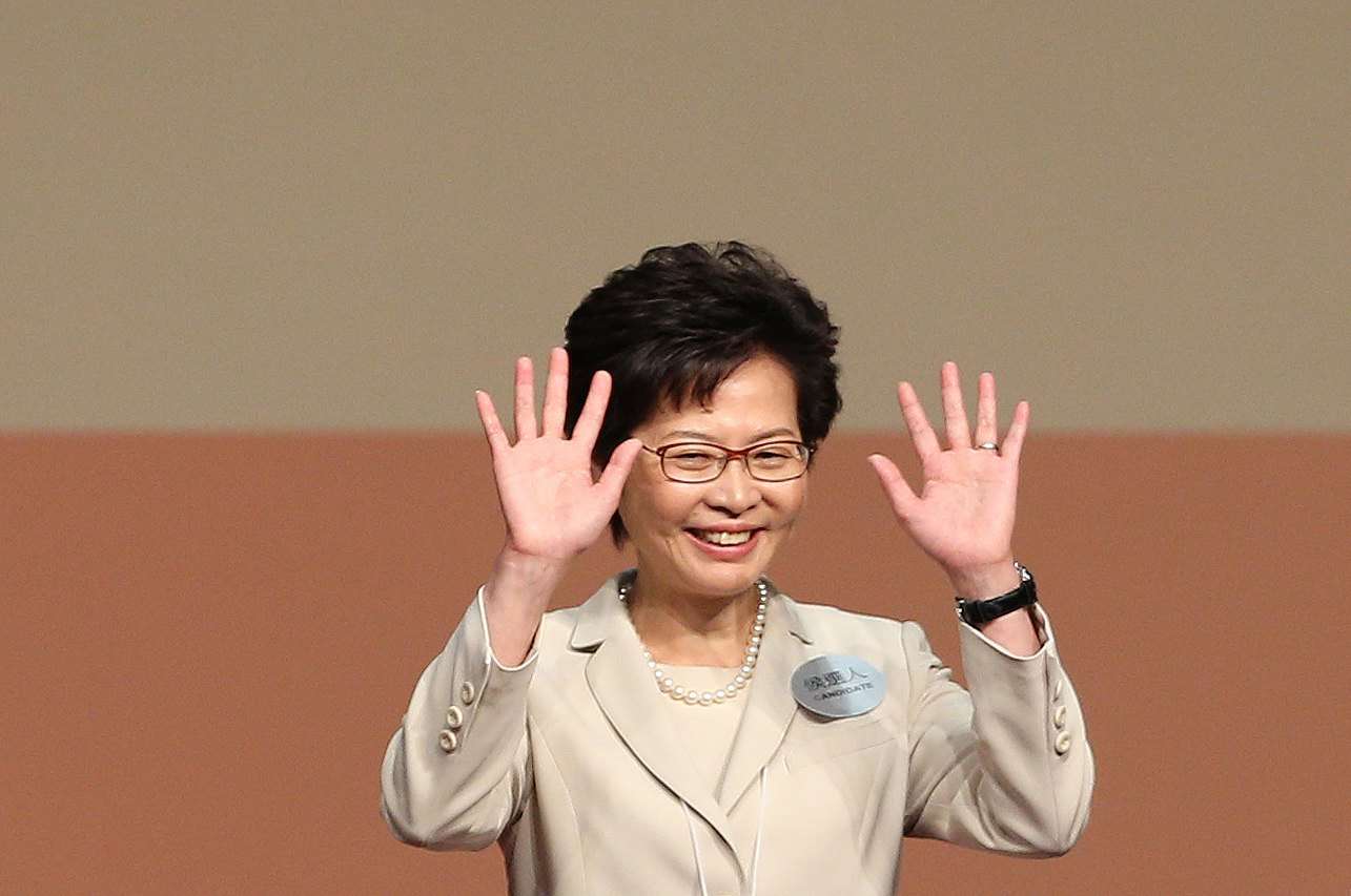 Hong Kong chief executive-elect Carrie Lam, seen here waving after she was declared the winner on March 26, must try and assemble a credible administration. Photo: EPA