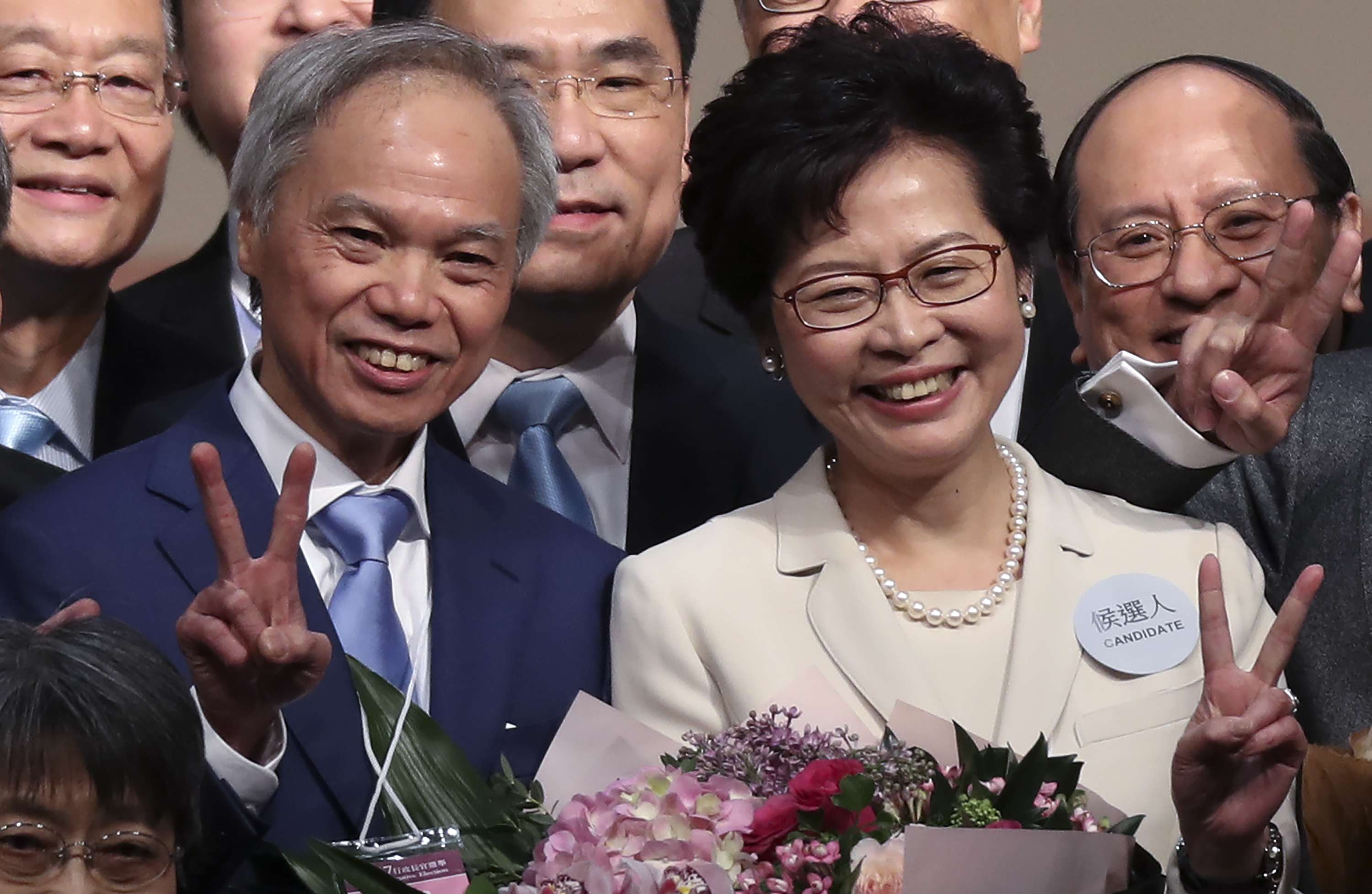 Carrie Lam and husband Lam Siu-por (left) will embark on a four-day trip to Beijing from Sunday. Photo: Robert Ng