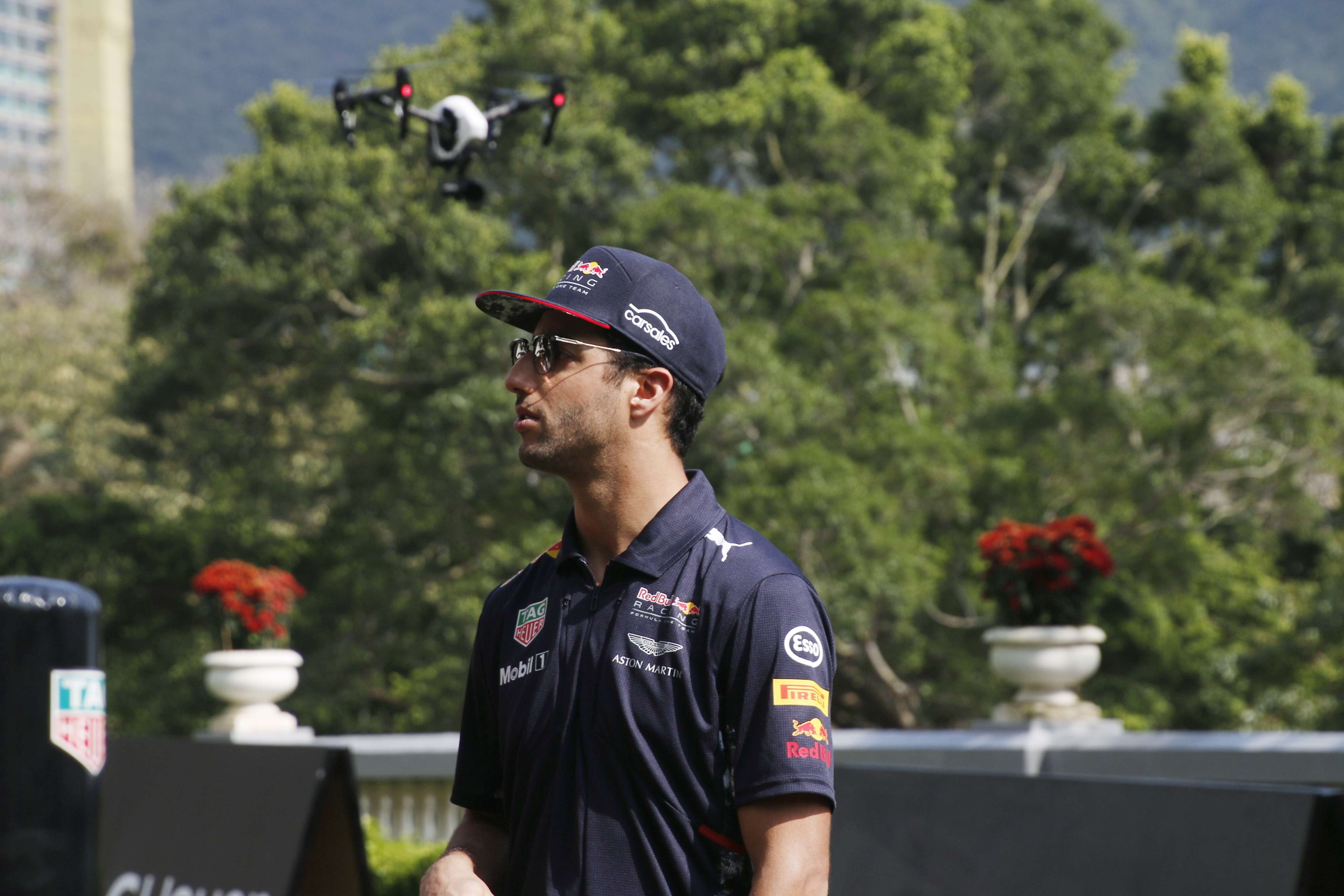 A drone follows the moves of Formula One star Daniel Ricciardo of Red Bull during a press conference at Repulse Bay. Photo: Unus Alladin
