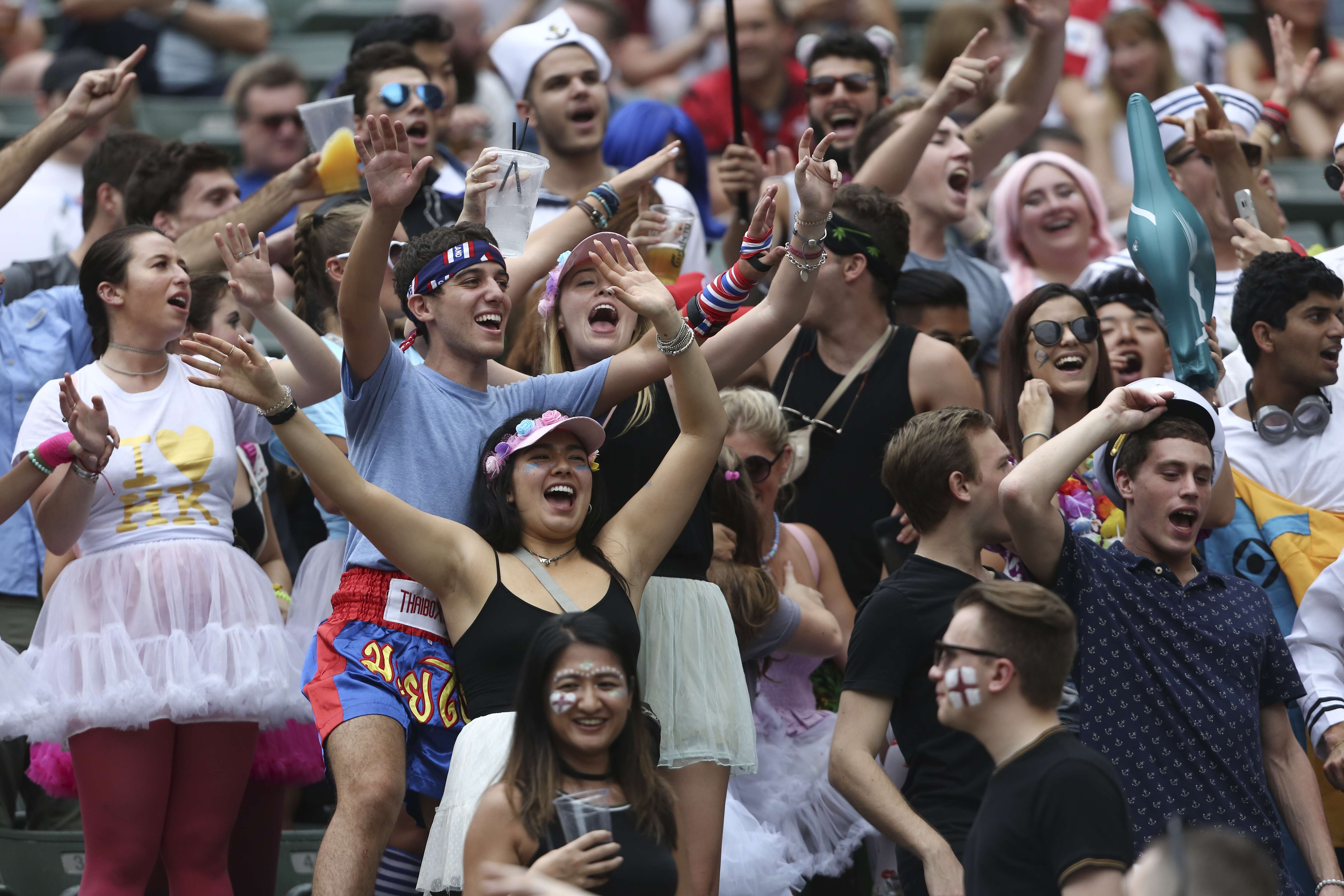 Sevens exuberance takes hold in the south stand of the Hong Kong Stadium. Photo: Jonathan Wong