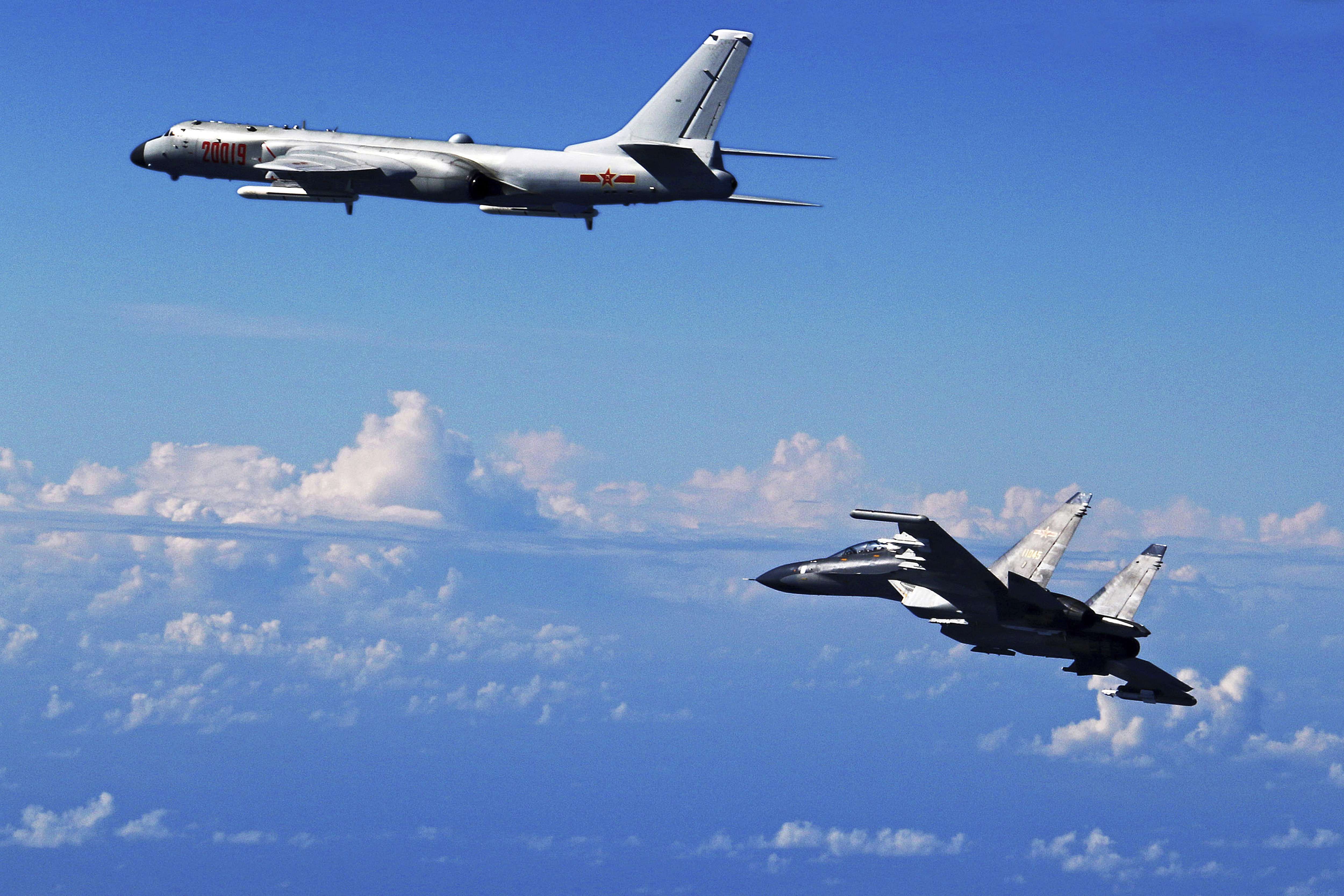 Chinese military aircraft take part in drill near the East China Sea. The armed forces of China and the United States will set up a new dialogue mechanism as a further step to minimise military confrontation. Photo: Xinhua