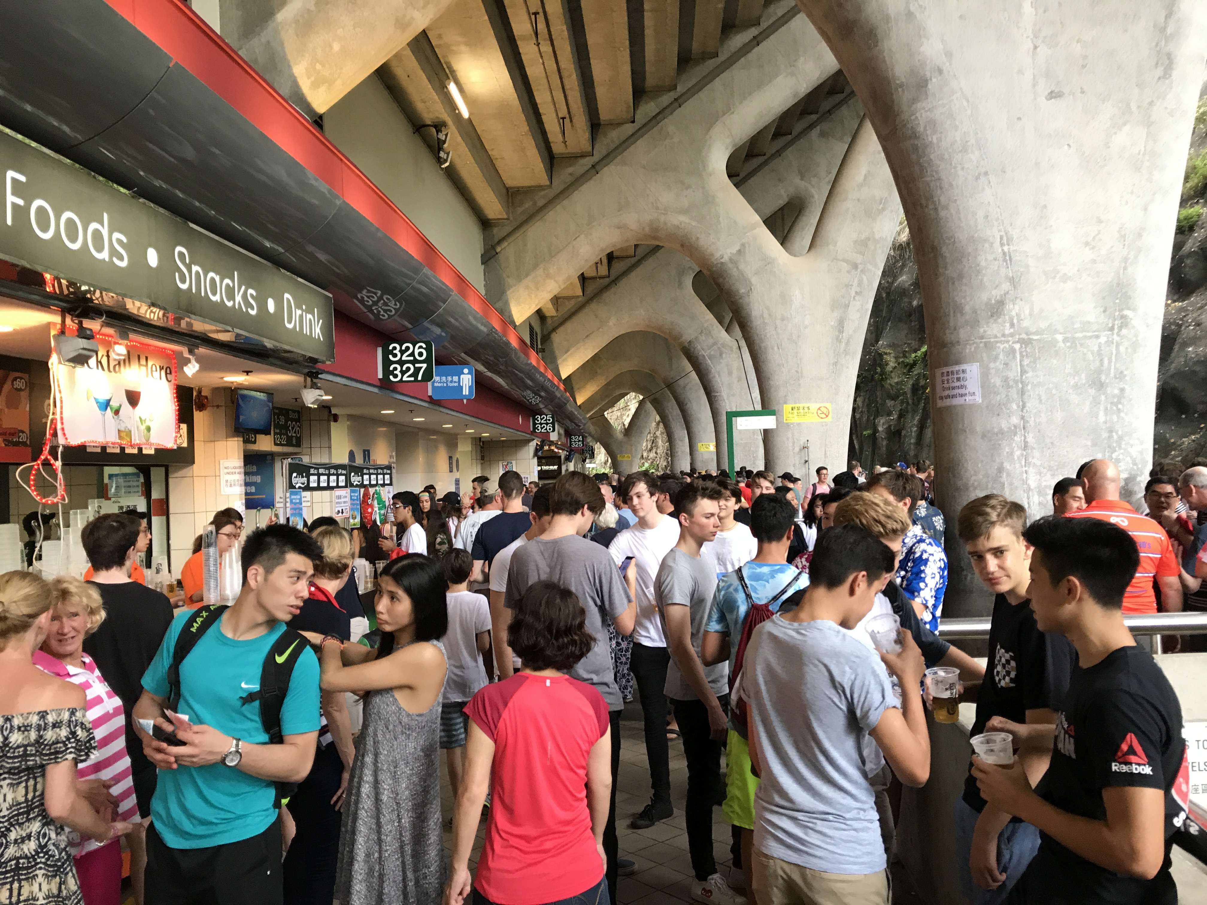 People gather on the concourse at Hong Kong Stadium drinking during the Hong Kong Sevens. Photos: Handout
