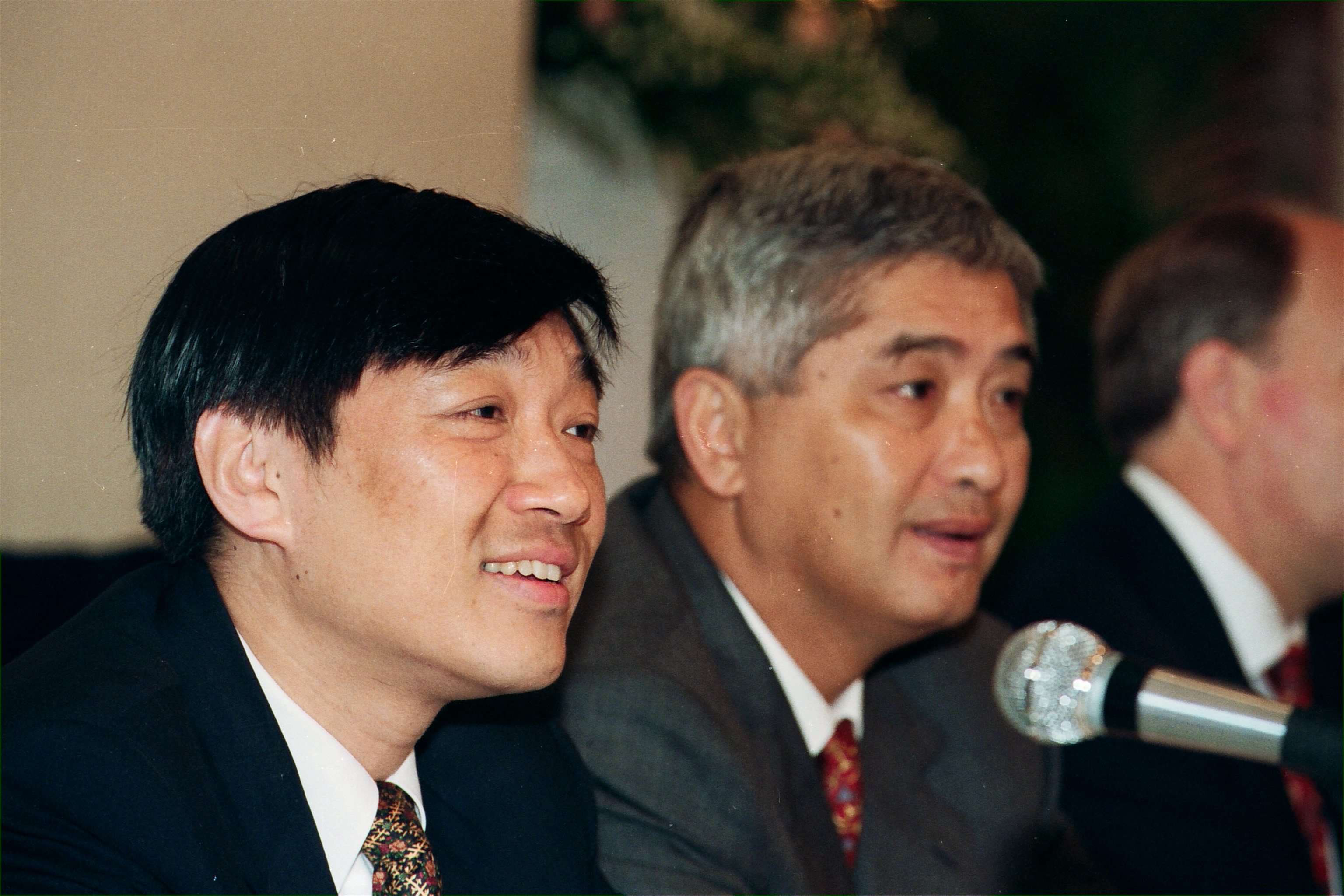 Citic’s former managing director Henry Fan Hung-ling and former chairman Larry Yung Chi-kin during a company event in 1995.