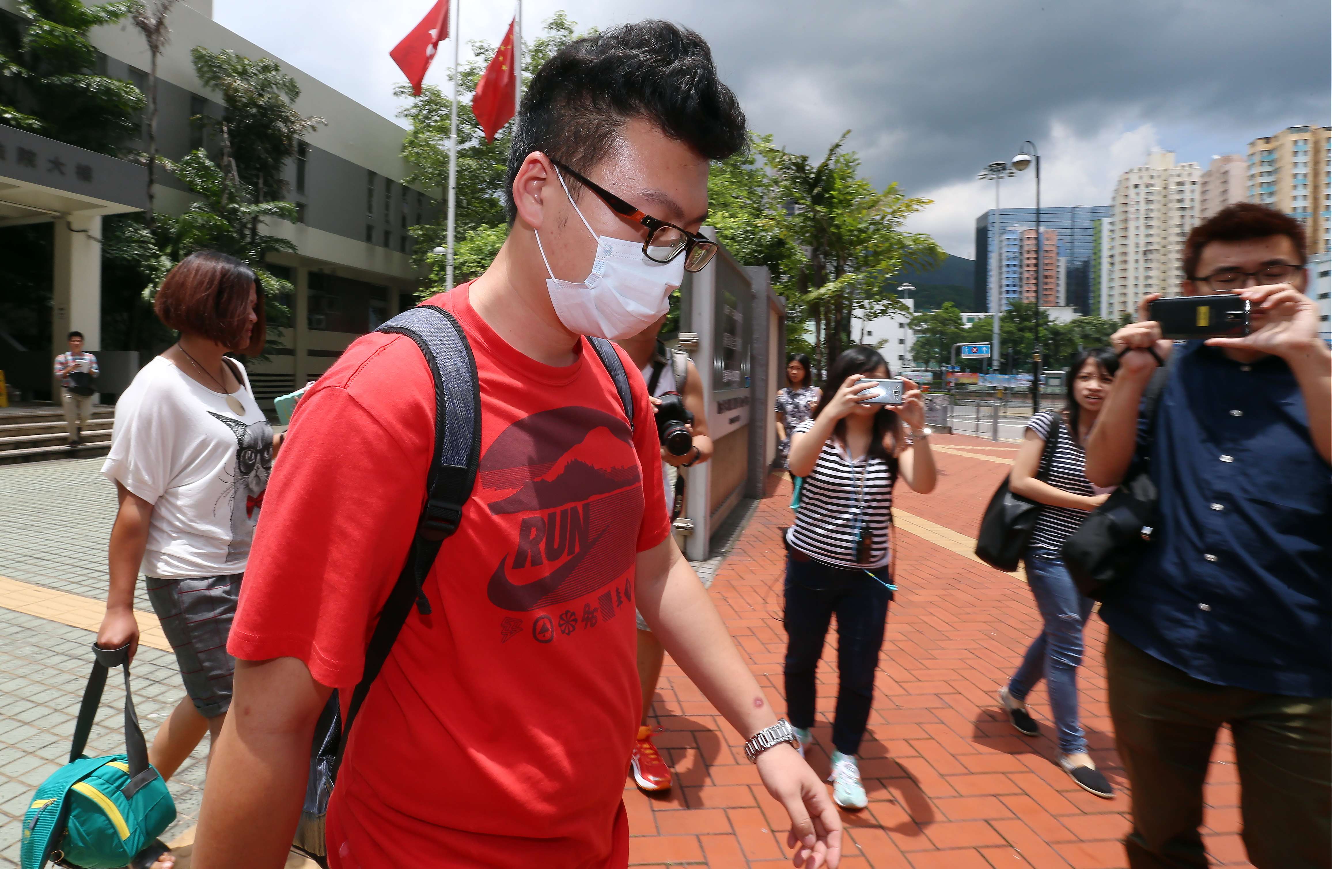 Li Haoxuan, one of six mainland tourists arrested at Hong Kong International Airport on suspicion of assaulting seven ground crew, appears at Tsuen Wan Court in 2015. Li was slapped with a HK$1,5000 fine after he pleaded guilty to causing a nuisance and annoyance by pouring water on a ground staff member the previous day. Photo: K.Y. Cheng