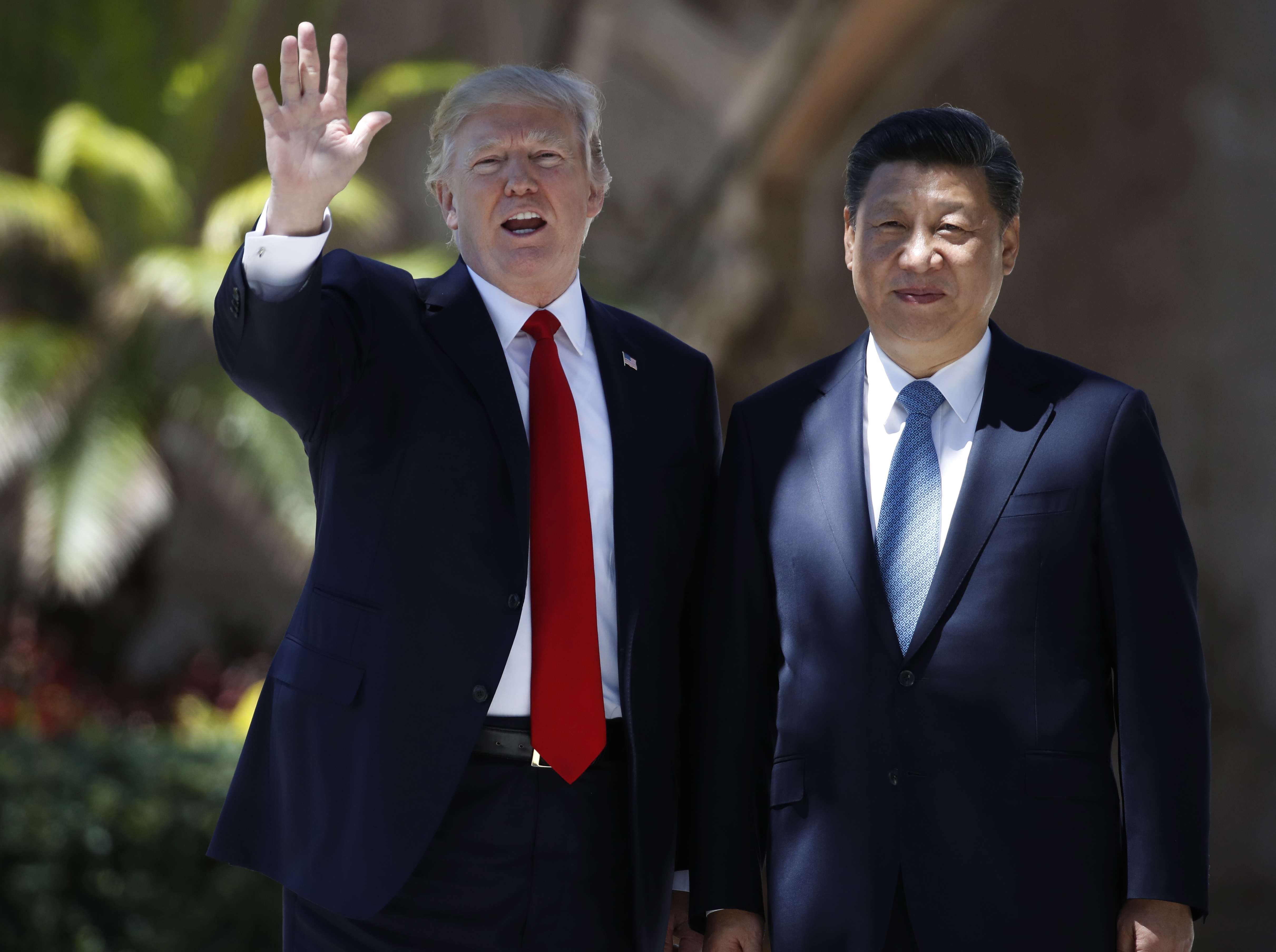US President Donald Trump and China’s President Xi Jinping pause for photographs at Mar-a-Lago, in Palm Beach, Florida. File photo: AP