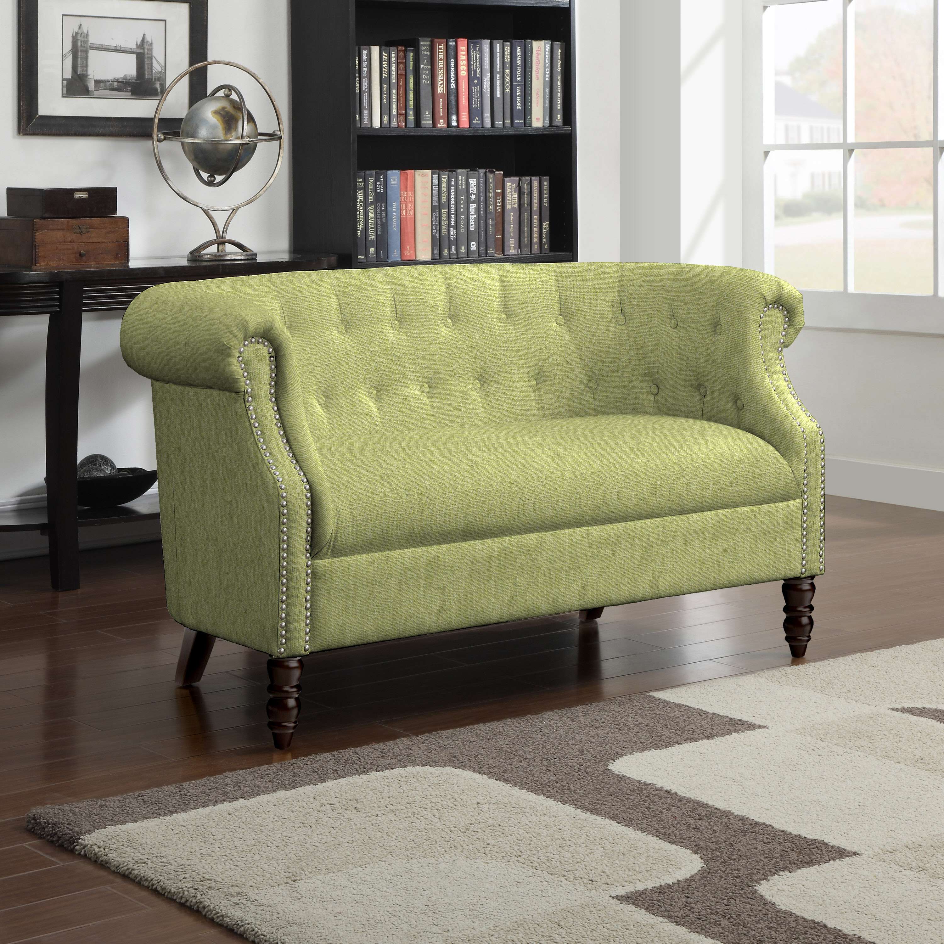 Pantone (sofa, above) believes pops of verdant hues in the home help us reconnect with nature.