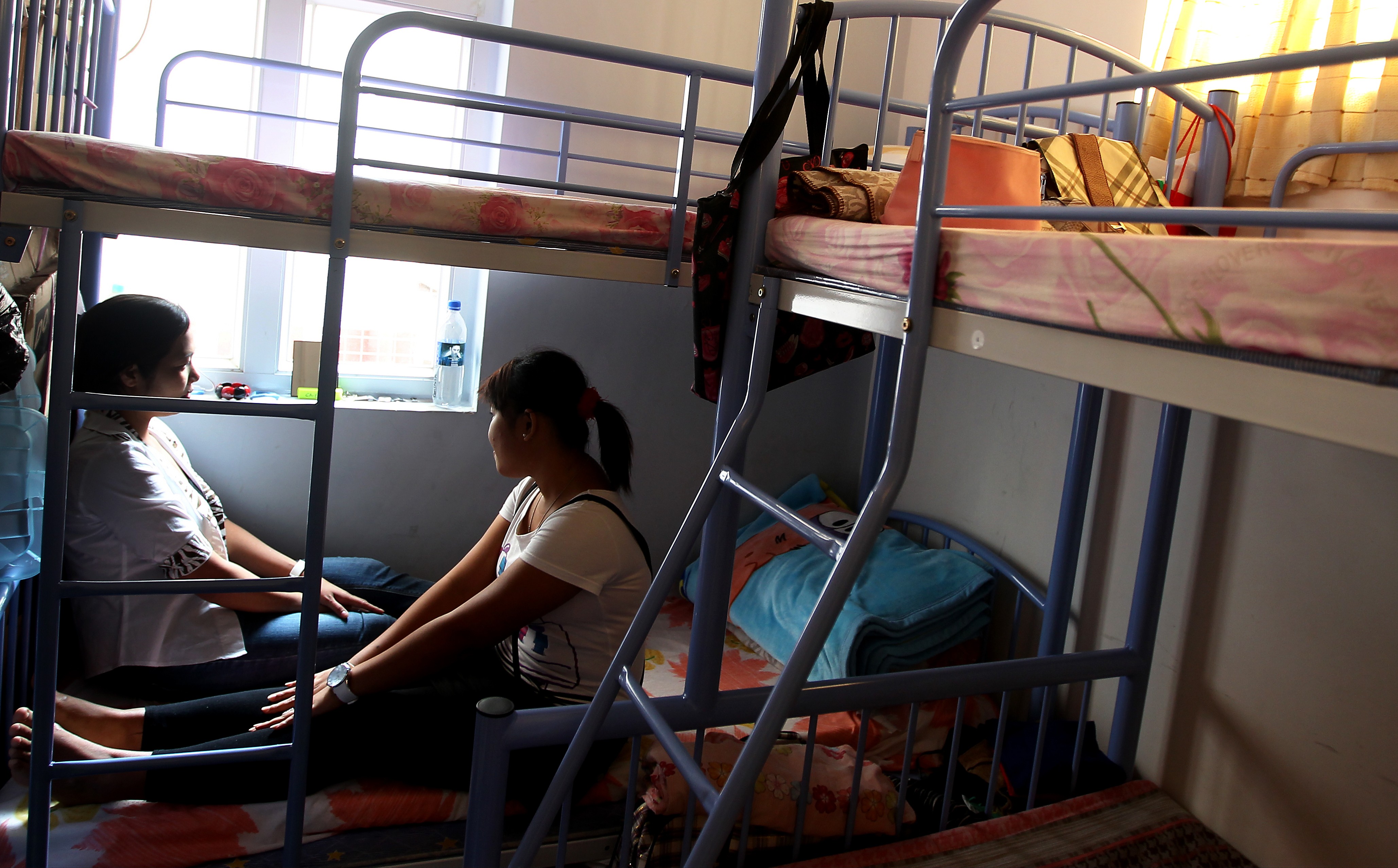 Two domestic workers find shelter in the Bethune House Migrant Women’s Refuge after running into difficulties. Photo: Jonathan Wong