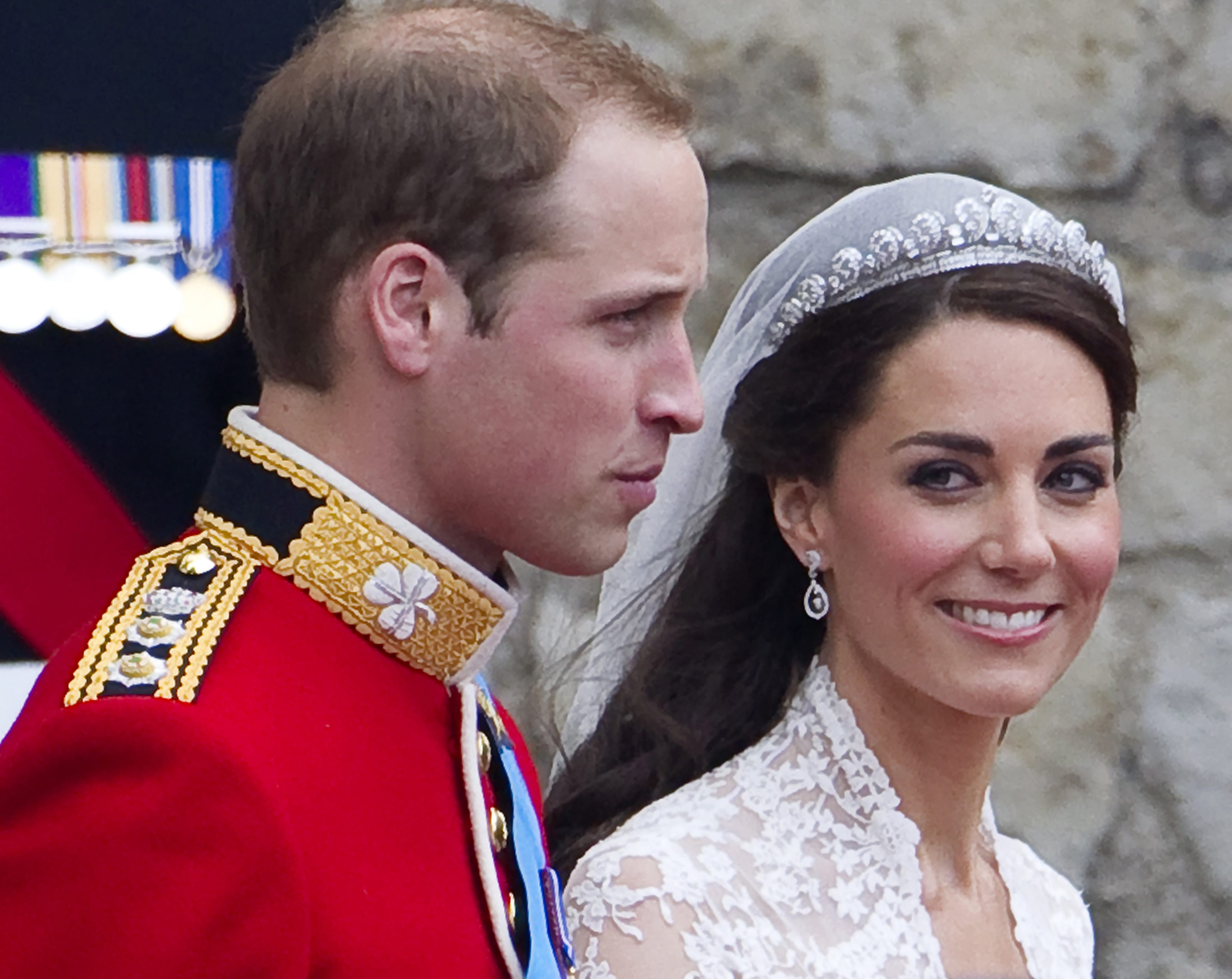 Catherine Duchess of Cambridge and Britain's Prince William, leaving Westminster Abbey after their wedding ceremony. The Duchess wore a Cartier tiara on her wedding day. Photo: EPA