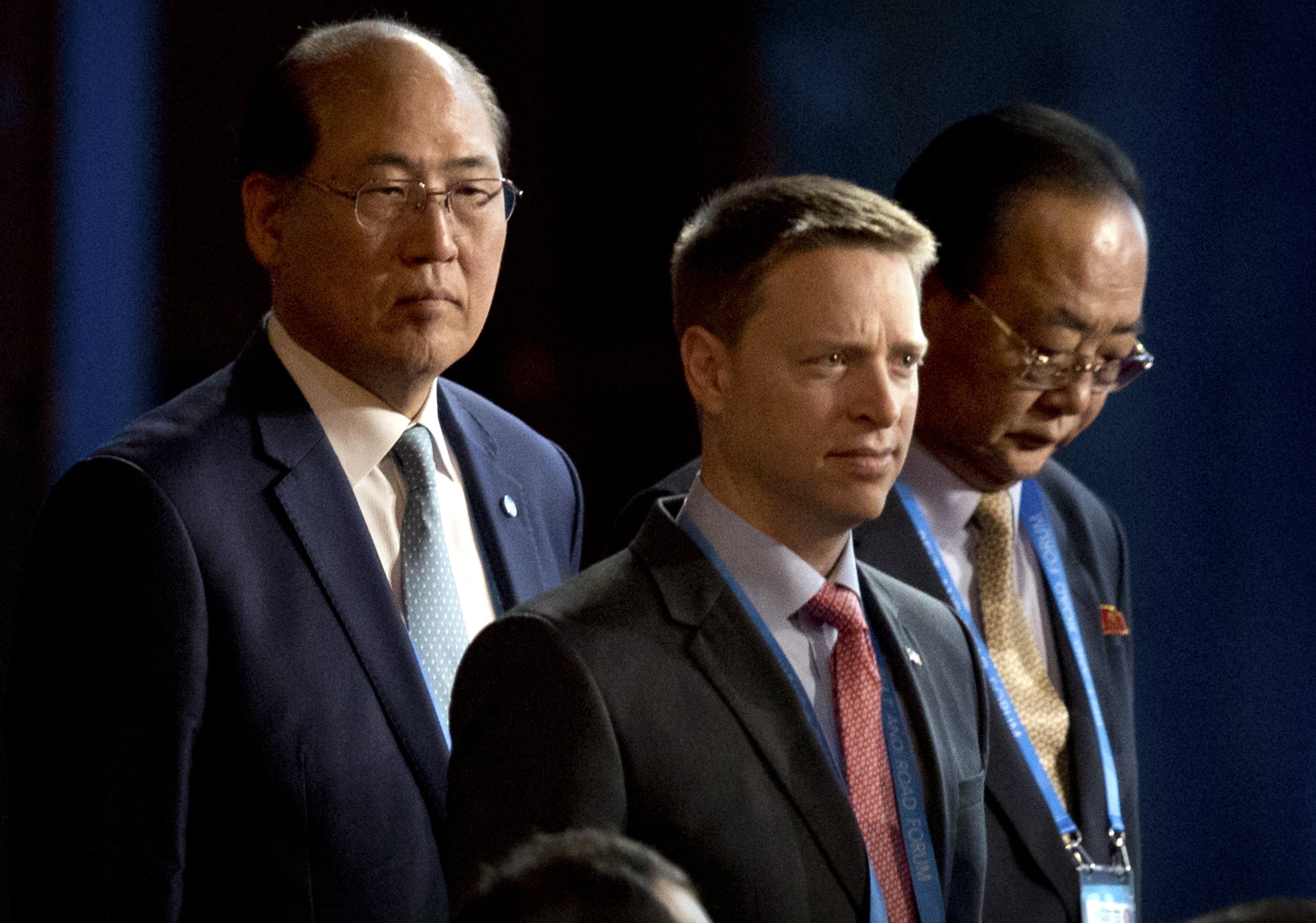 Matt Pottinger (centre), Special Assistant to US President Donald Trump and National Security Council (NSC) Senior Director for East Asia, and Kim Yong Jae (R), North Korea’s minister of external economic relations, arrive for the opening ceremony of the Belt and Road Forum (BRF) at the China National Convention Centre (CNCC) in Beijing, China, 14 May 2017. Photo: EPA