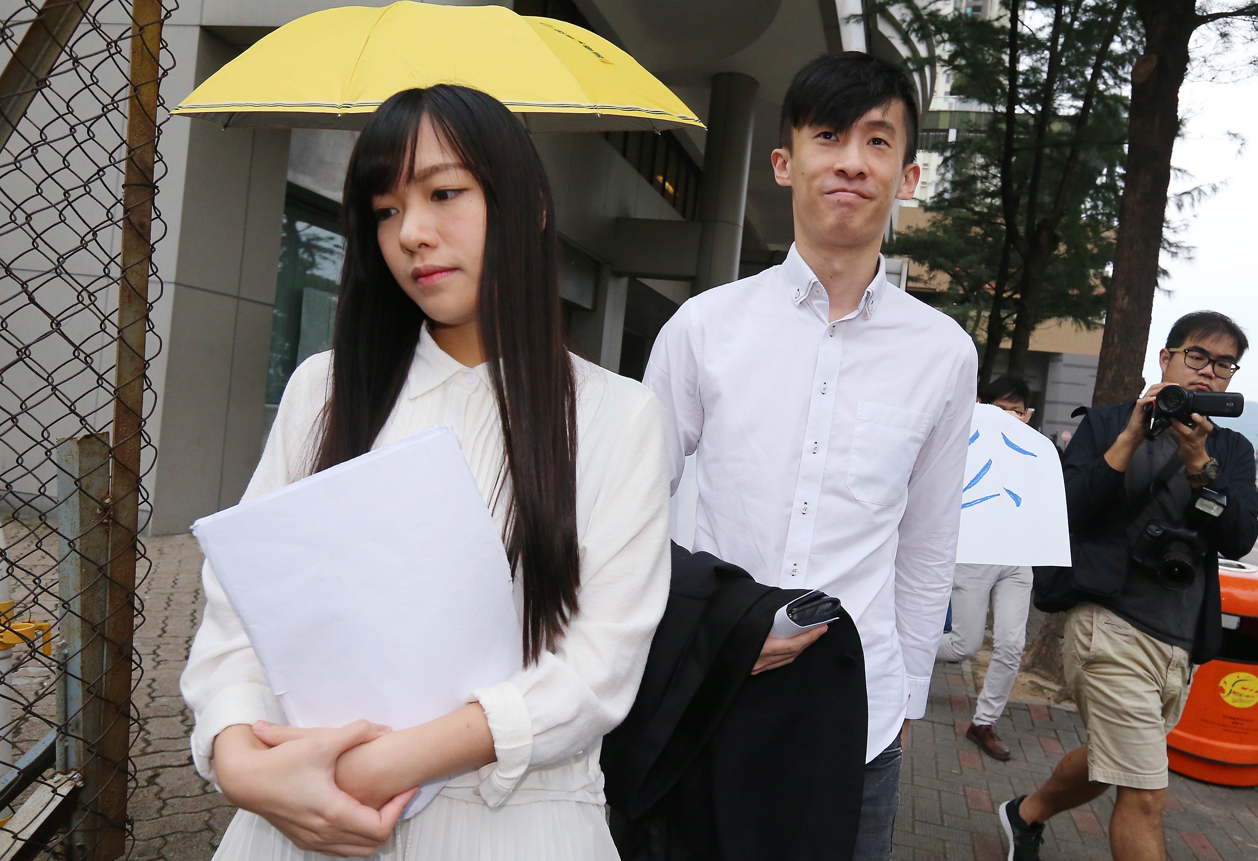 Yau Wai-ching and Baggio Leung leave Eastern Court after the hearing. Photo: Dickson Lee