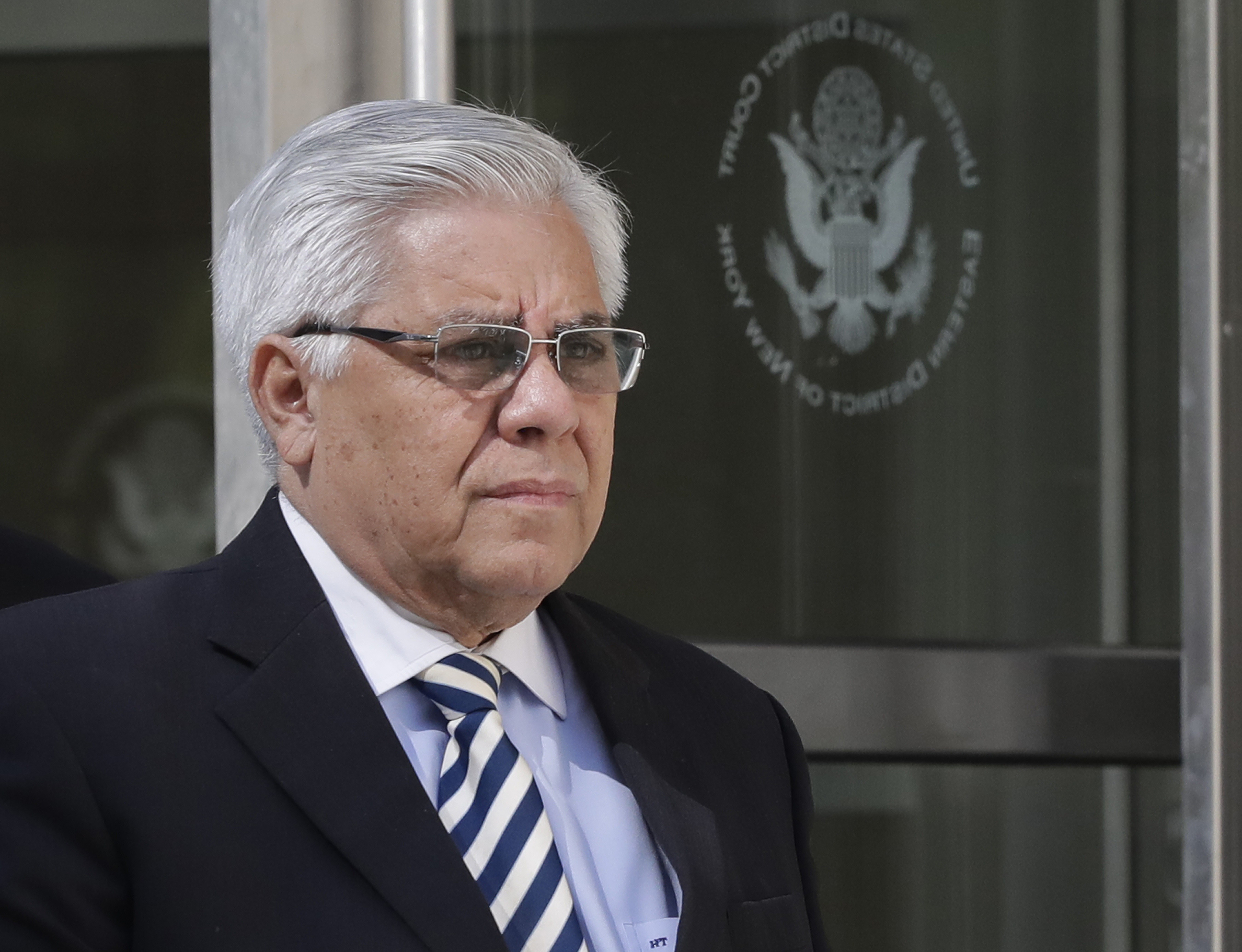 Former Guatemalan judge Hector Trujillo leaves Brooklyn federal court after pleading guilty. Photo: AP