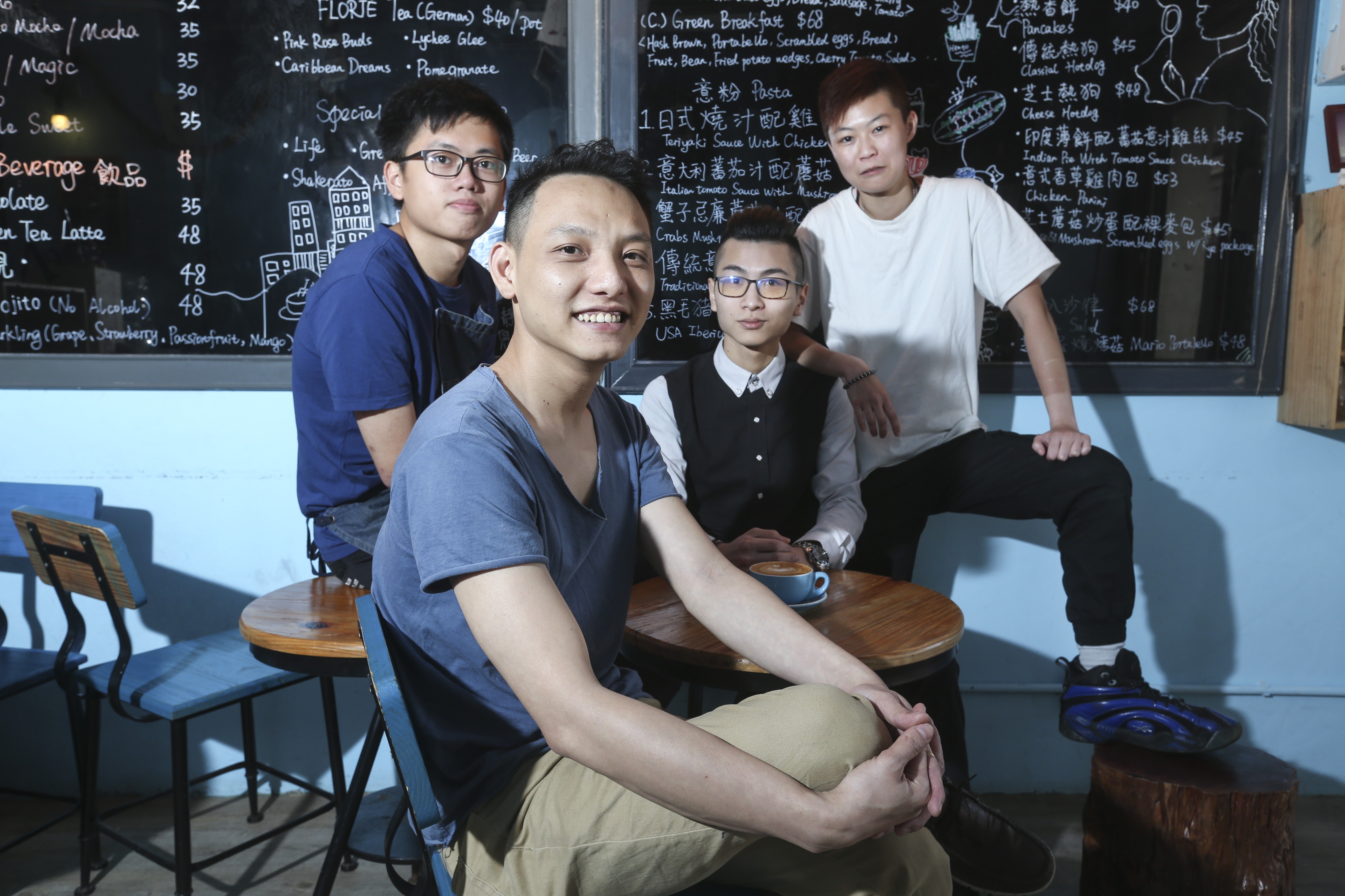 Cafe Heato owner Amen Chan Hoi-yuen (front) with his staff members (from left to right, behind) Wong Man-hon, Lam Ka-lun and Lai Ho-ching. Photo: K. Y. Cheng