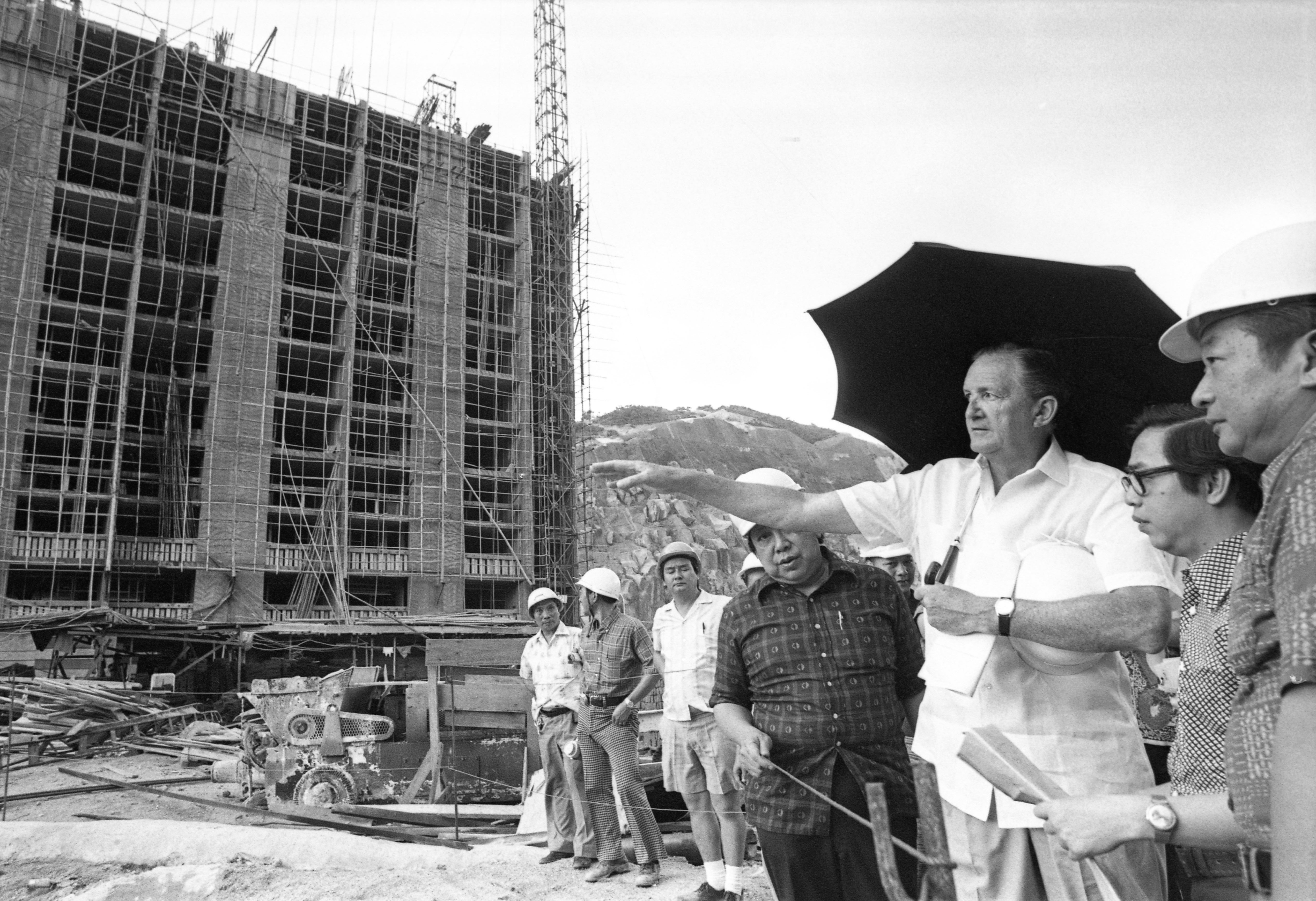 Governor Sir Murray MacLehose (left) visits Fu Shan Housing Estate which is under construction in 1977. Photo: SCMP