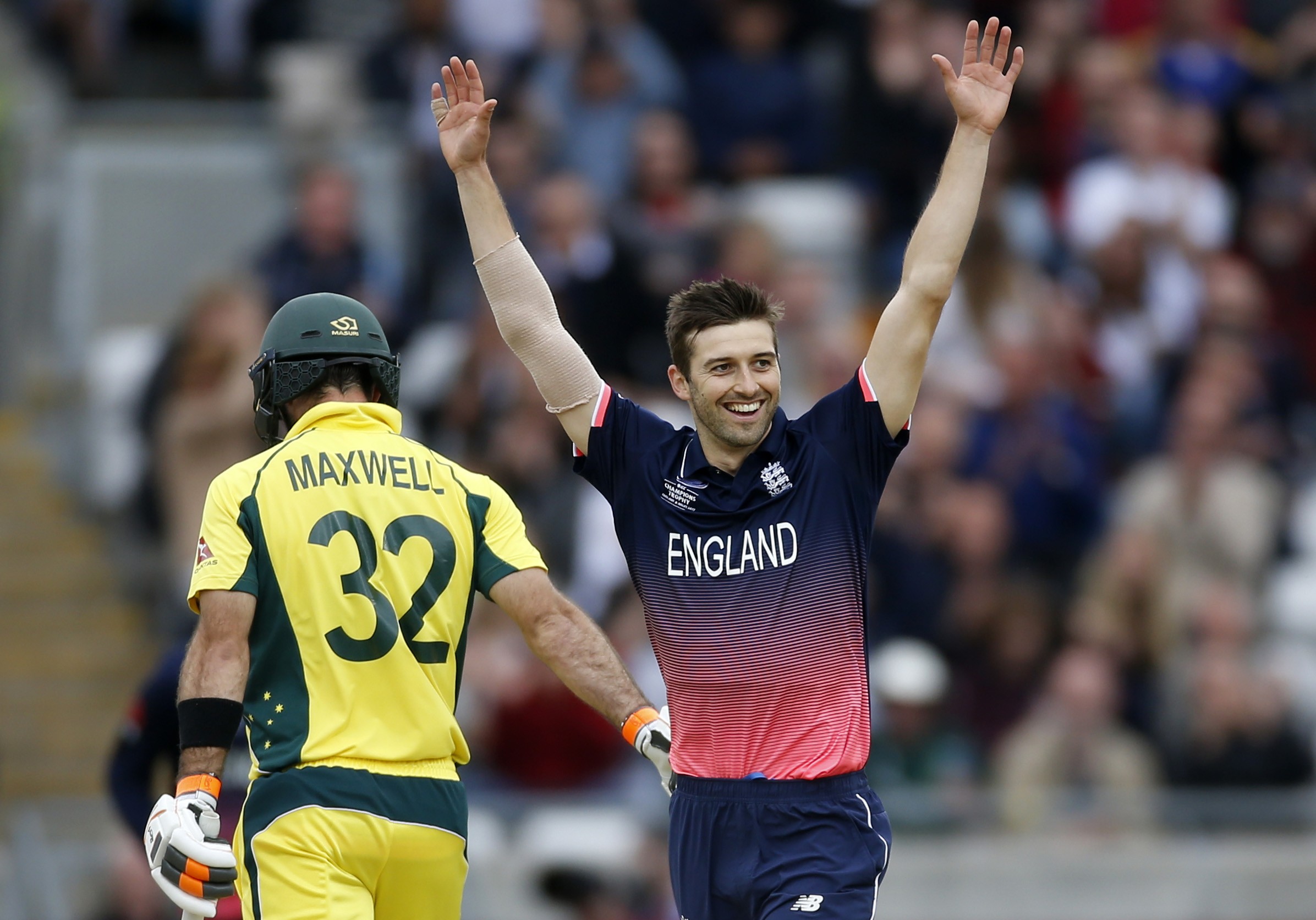 Mark Wood celebrates the wicket of Australia's Glenn Maxwell during England’s win in the Champions Trophy. Photos: Reuters