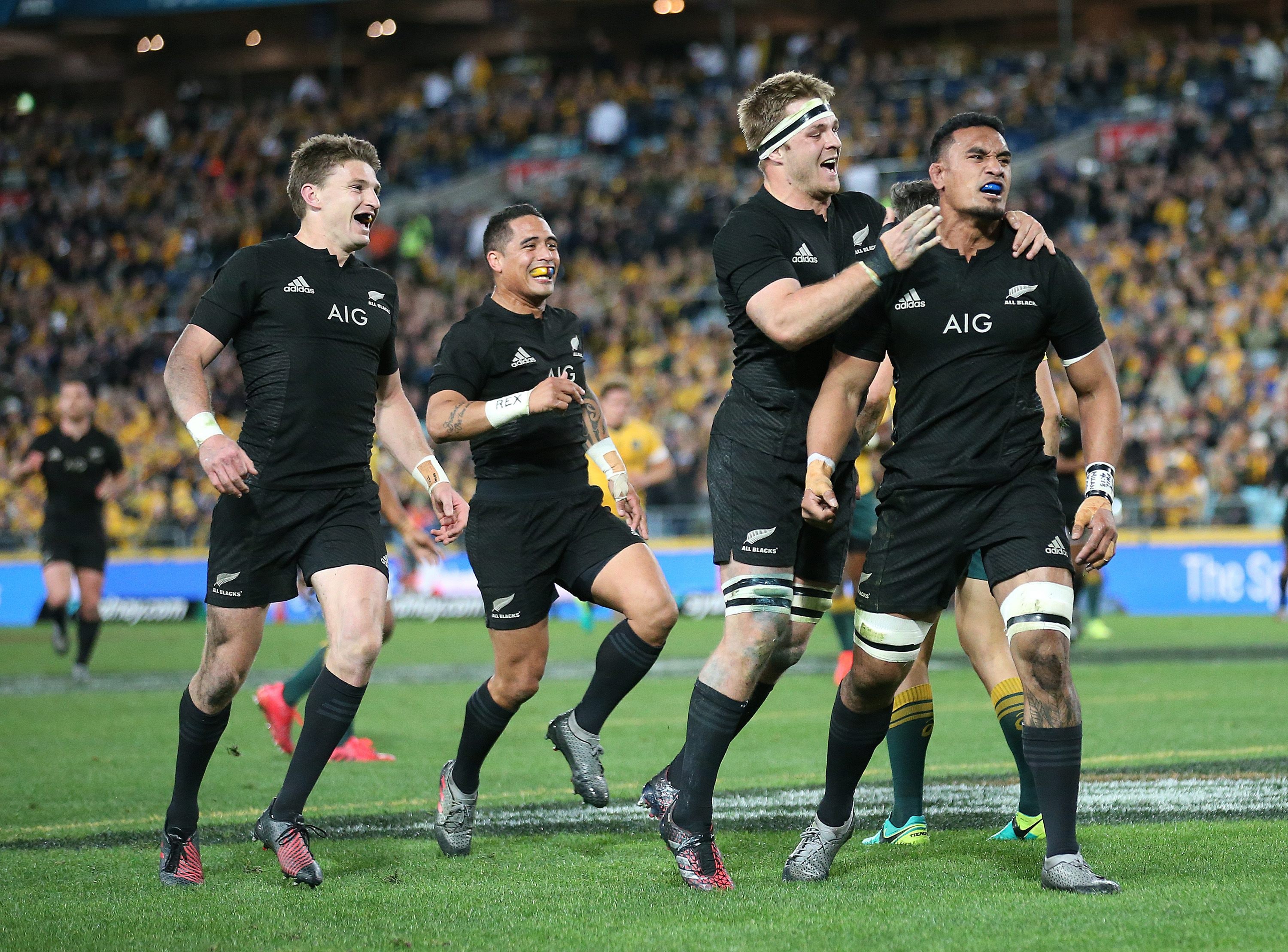 New Zealand's Jerome Kaino (right) celebrates with teammates after scoring a try during against Australia in 2016. Photo: EPA