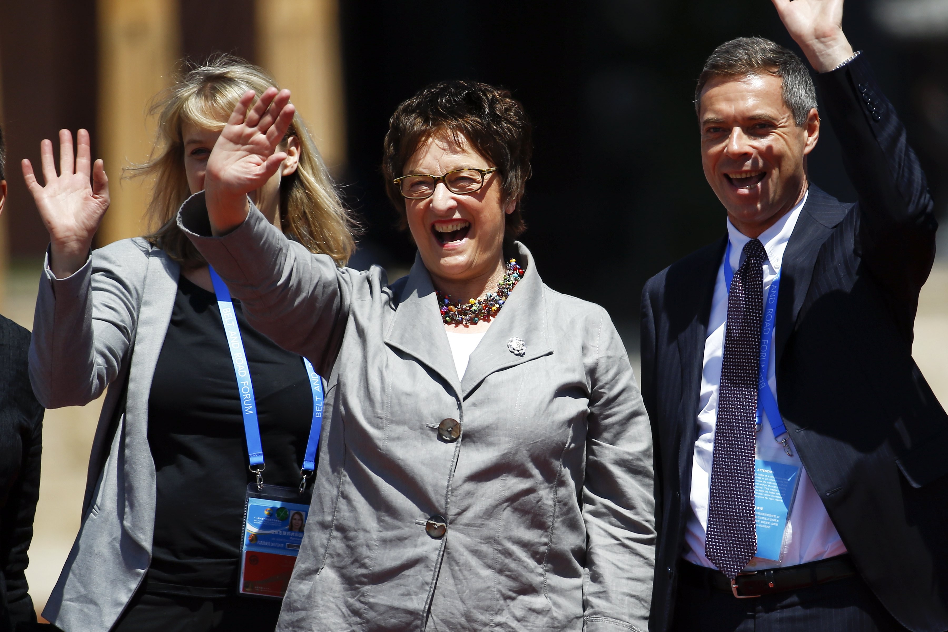 German Economy Minister Brigitte Zypries waves as she arrives for a group photo on the second and last day of the Belt and Road Forum in Beijing, on May 15. Photo: EPA