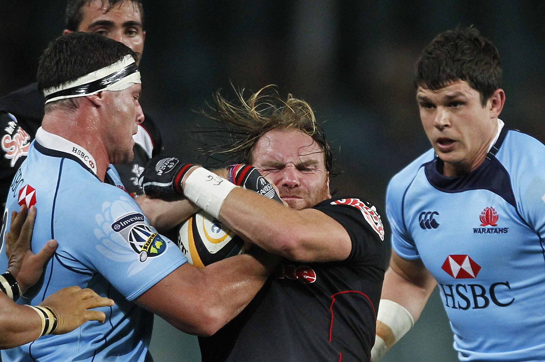 Andy Goode played for numerous clubs, including the Natal Sharks, as well as England. Picture carrying the ball into contact for . Photo: Reuters