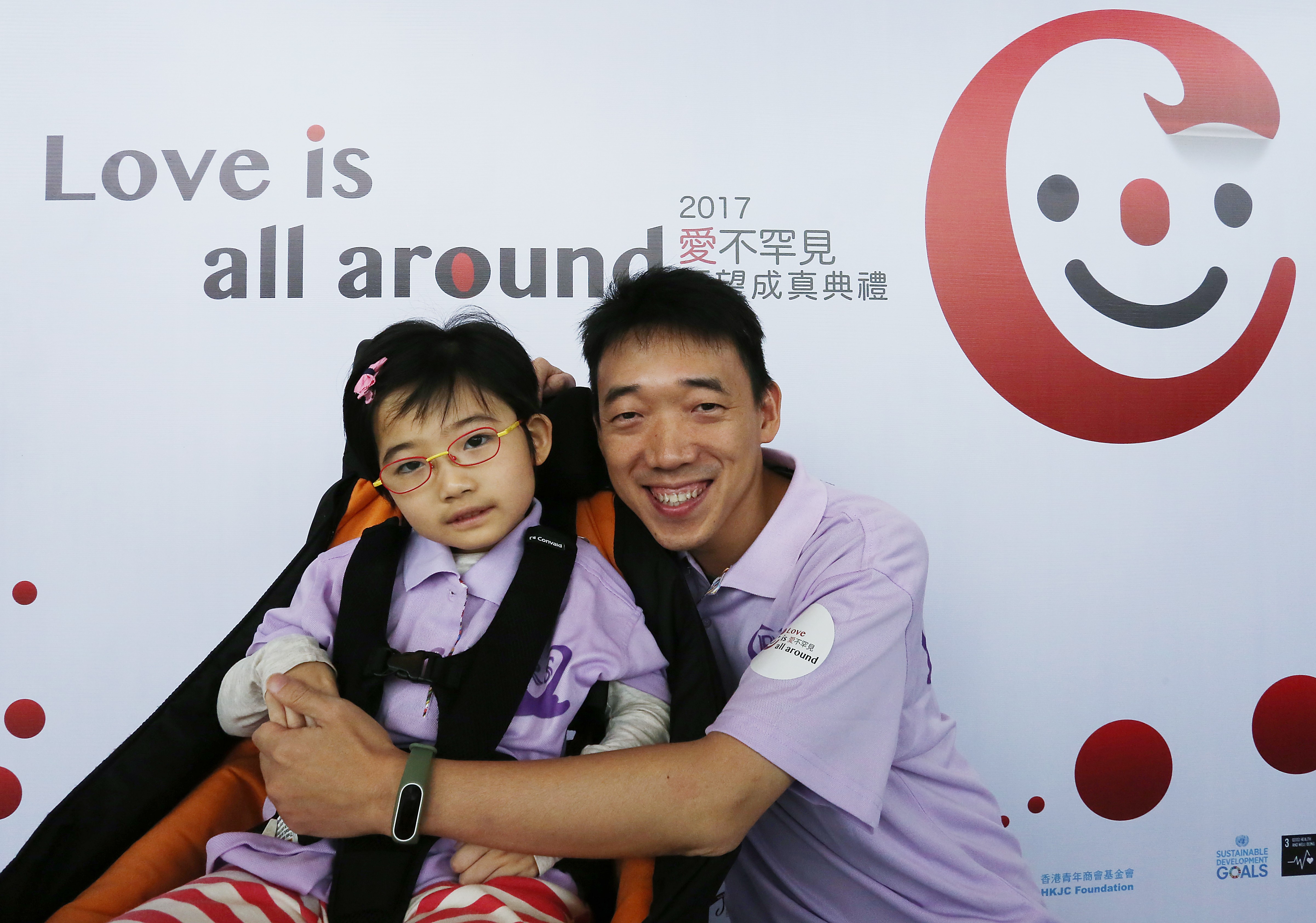 Byron Lai Chi-yung with his daughter Lai Wai-ting, who suffers from a rare neurological developmental disorder. Photo: Jonathan Wong