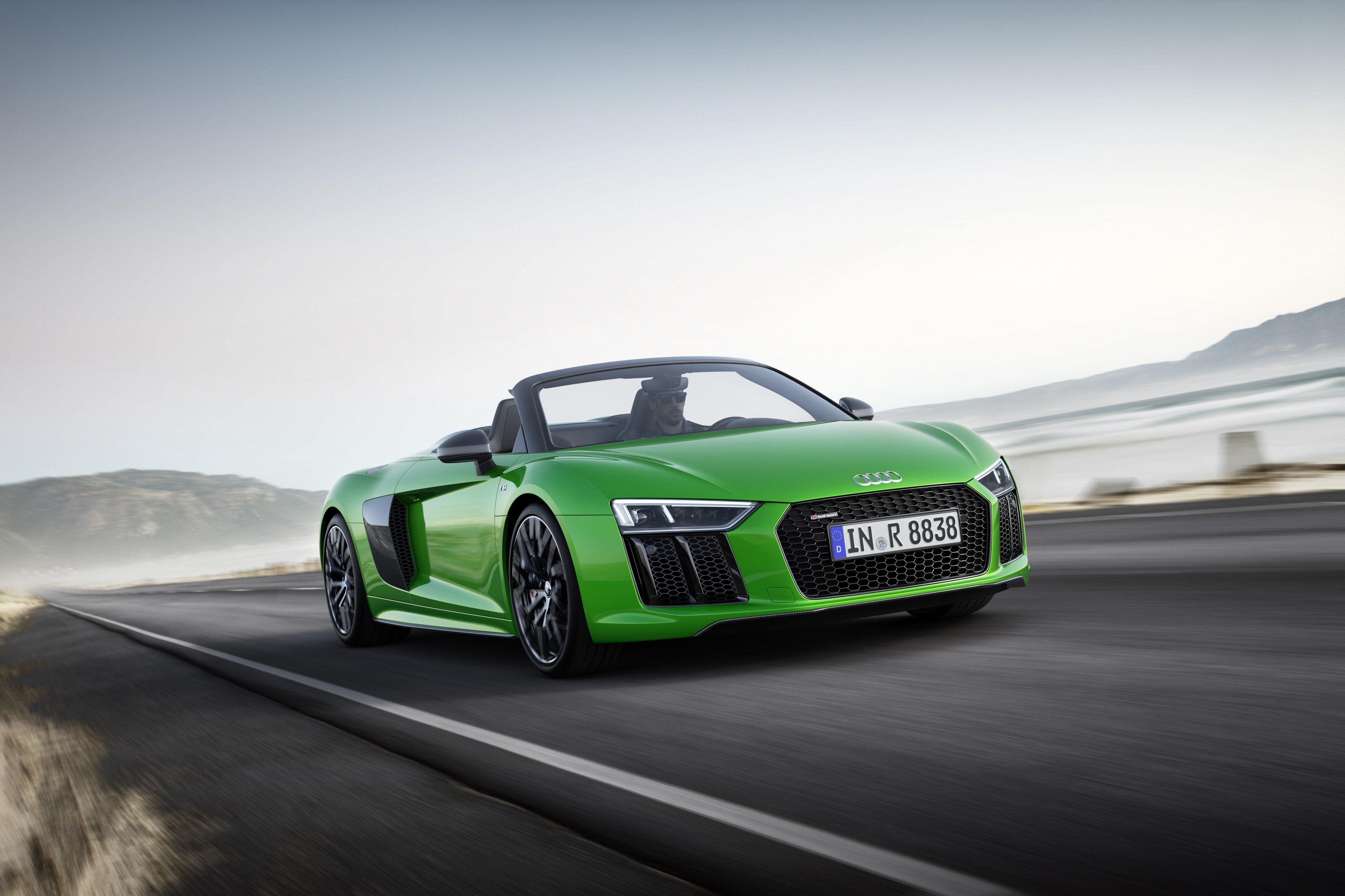Audi’s R8 Spyder V10 plus, seen in micrommat green, can accelerate to 100km/h in about 3.3 seconds and has a top speed of 336km/h. Photo: Handout