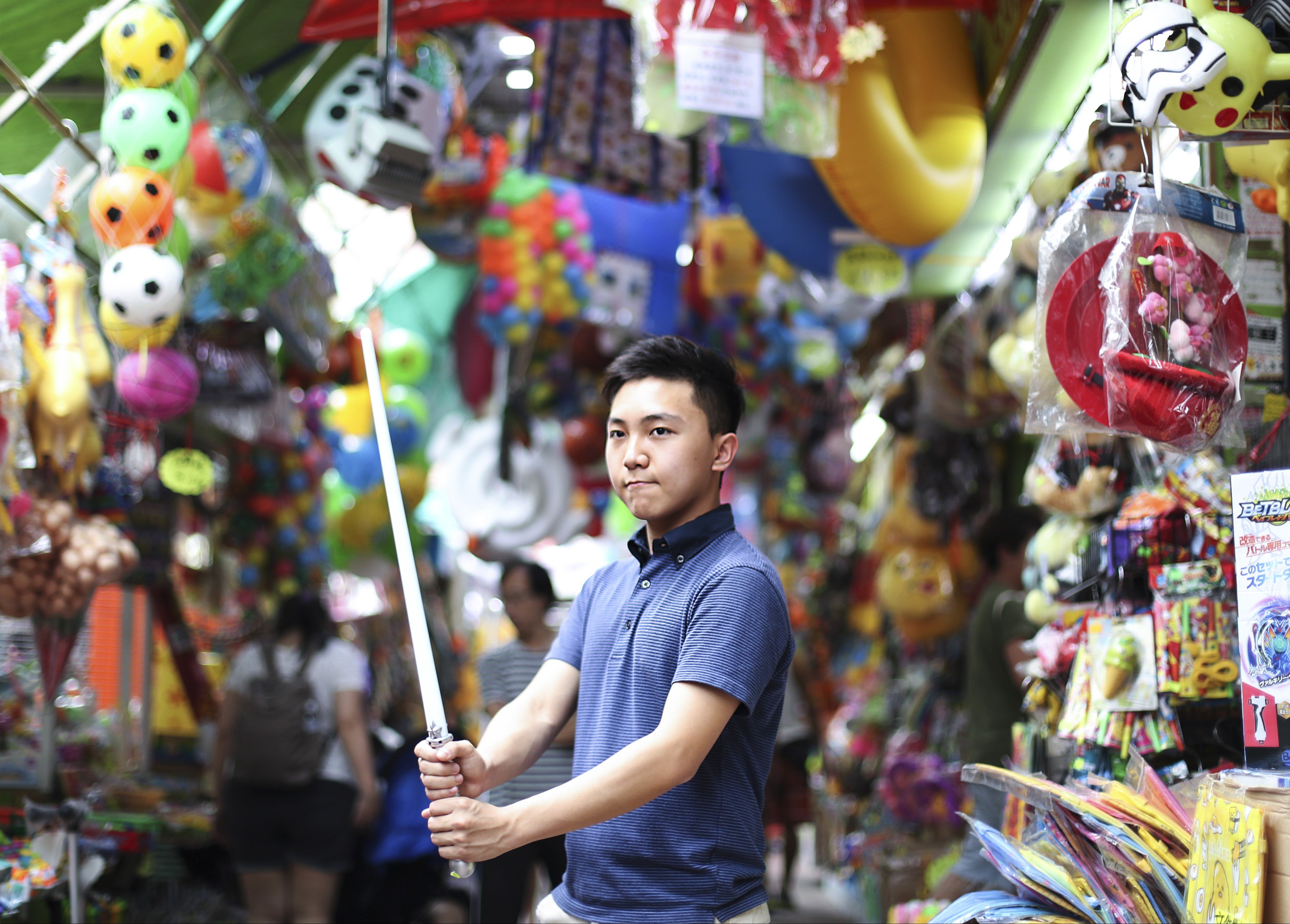 Porsche Kong spent his childhood around Apliu Street, Sham Shui Po and used to play with kids of the toy vendors along Fuk Wing Street. Photo: Nora Tam