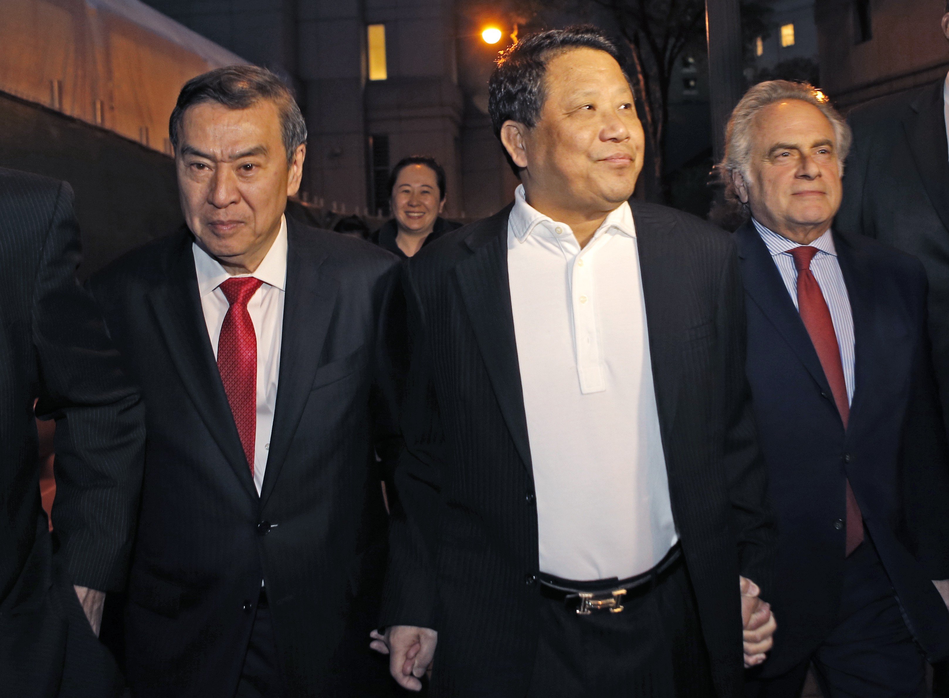 In this October 26, 2015, file photo, Macau billionaire Ng Lap-seng, centre, leaves federal court with his attorney Benjamin Brafman, right, after he was released on bail in connection with a United Nations bribery scheme in New York. Photo: AP