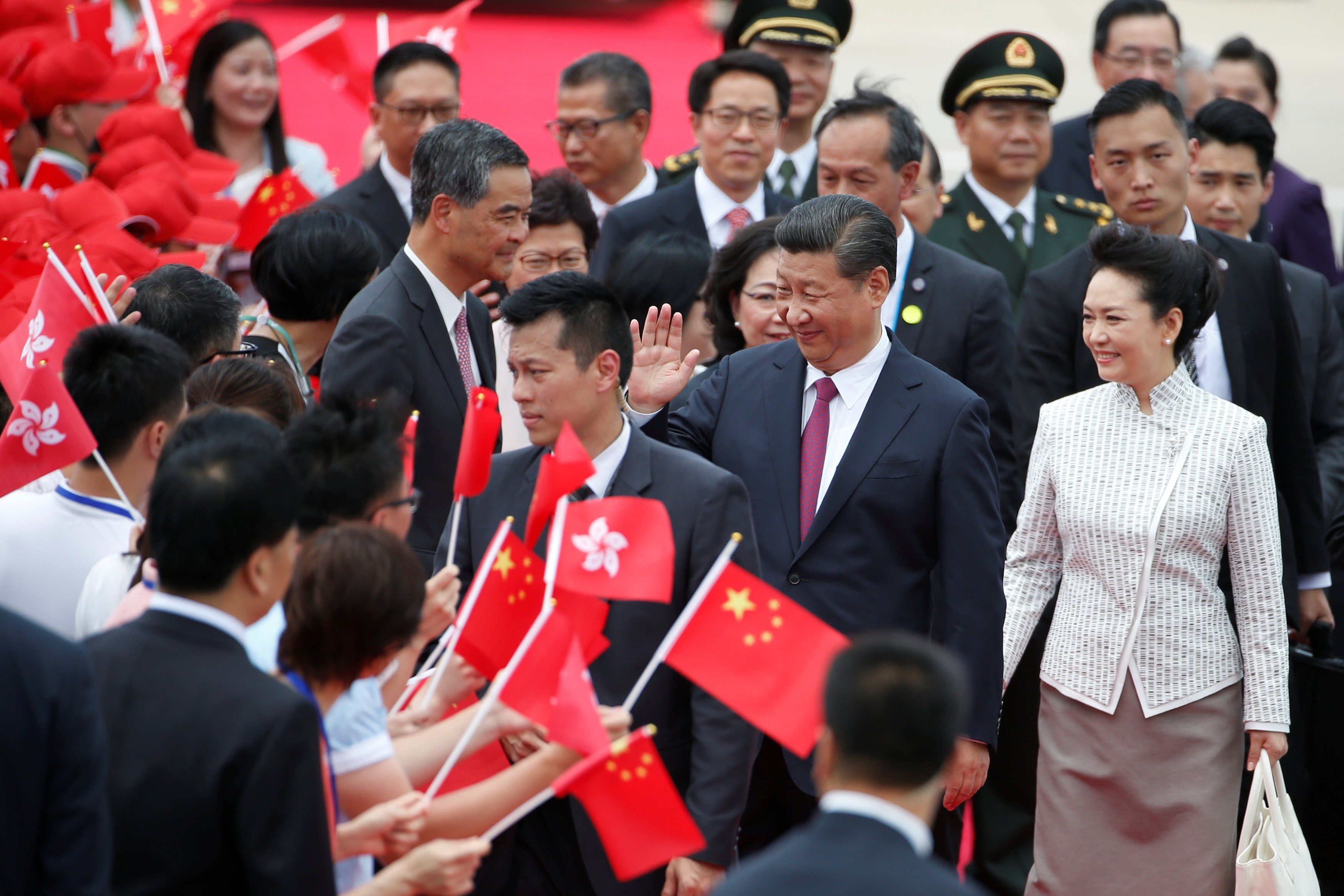 President Xi Jinping and his wife Peng Liyuan arriving at Hong Kong International Airport. Photo: Reuters
