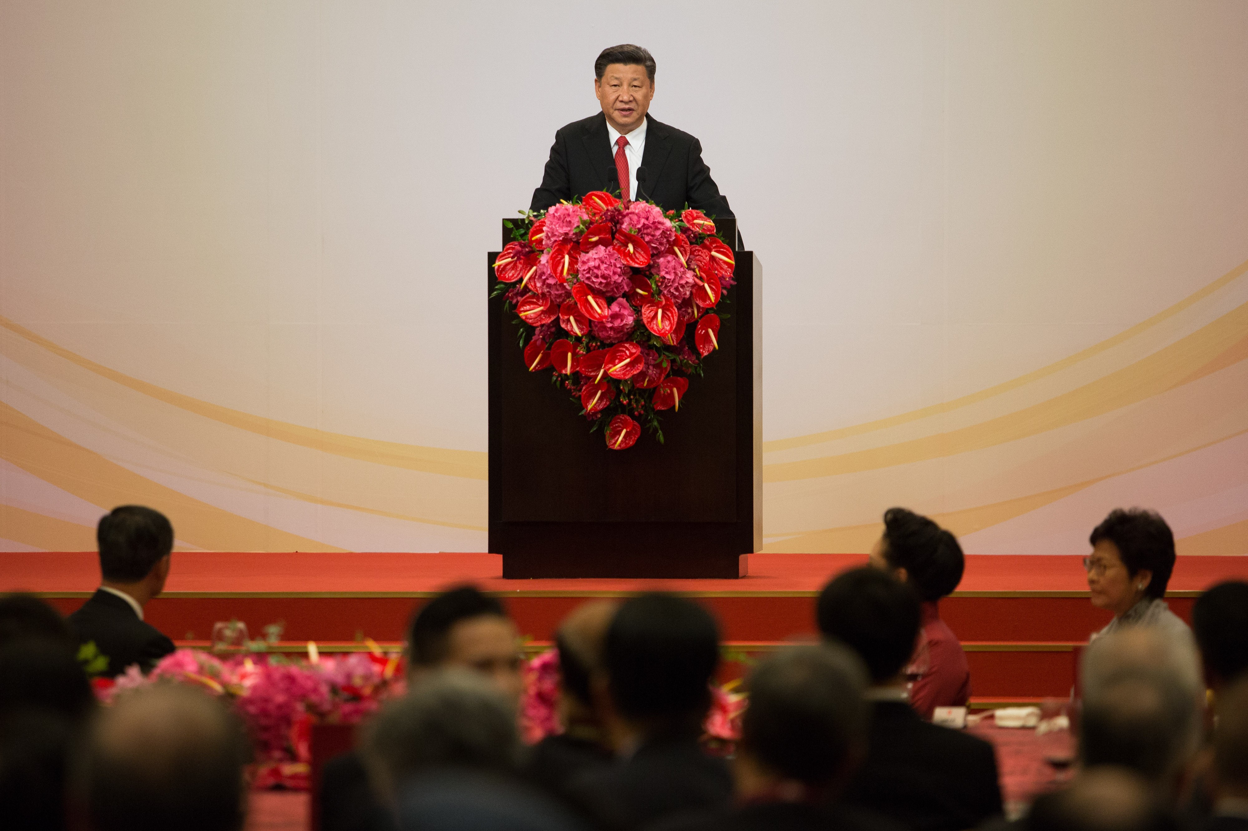 Xi Jinping is addressing a banquet attended by more than 300 representatives from the business, social and political sectors in Hong Kong. Photo: Bloomberg