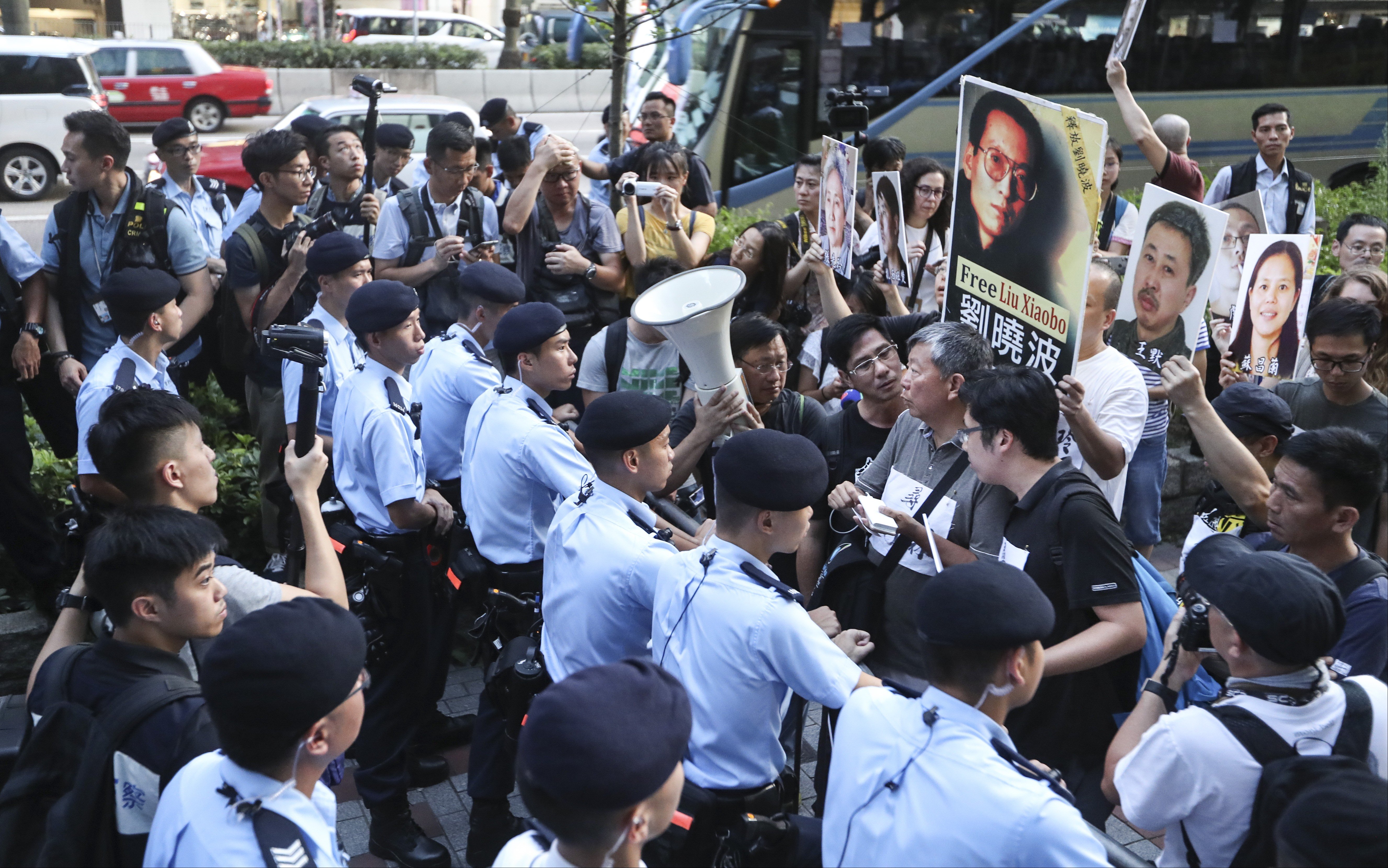 Protesters call for the release of mainland dissident Liu Xiaobo. Photo: Nora Tam