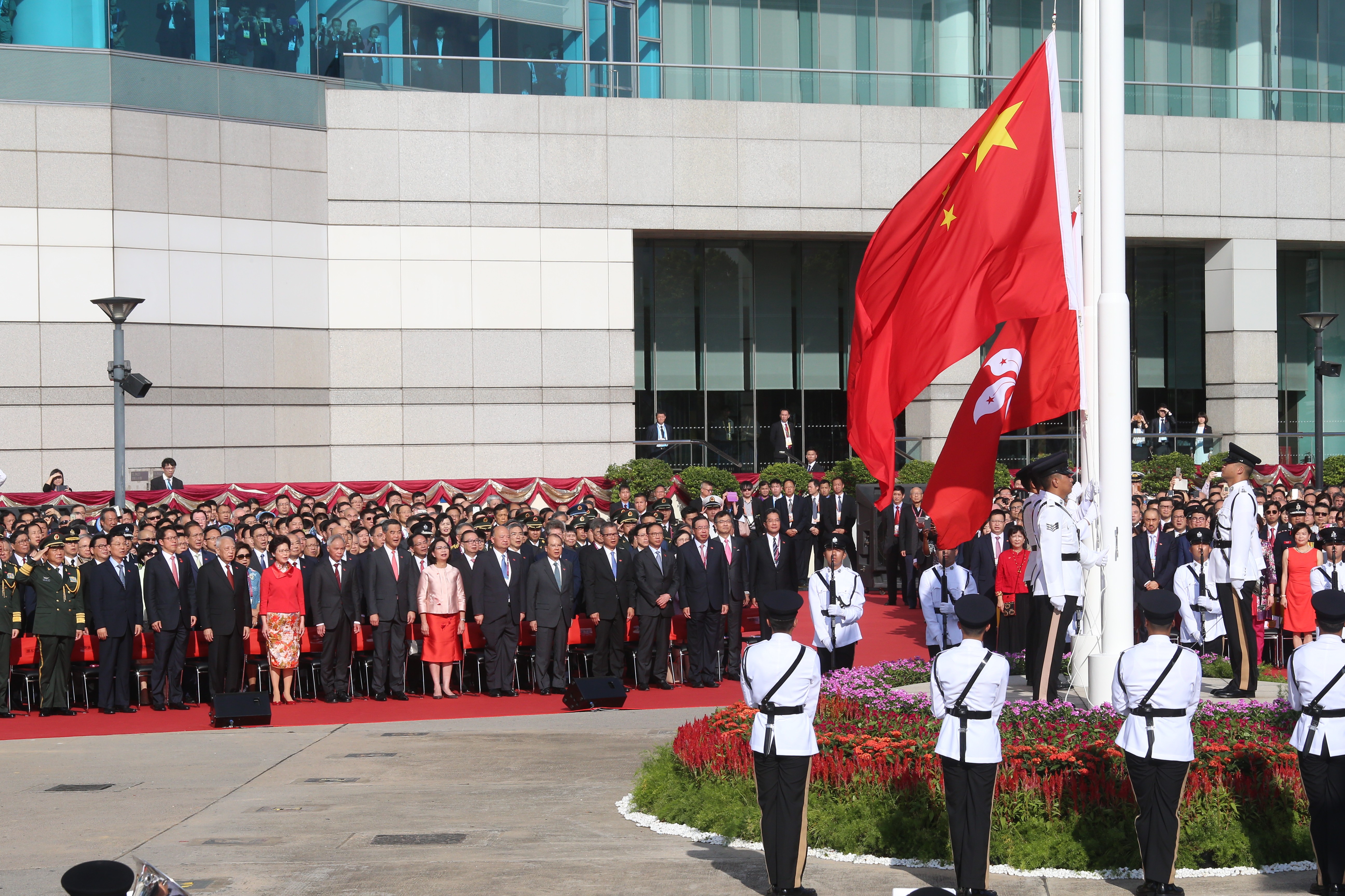 Carrie Lam led the flag-raising ceremony at Golden Bauhinia Square. Photo: K. Y. Cheng