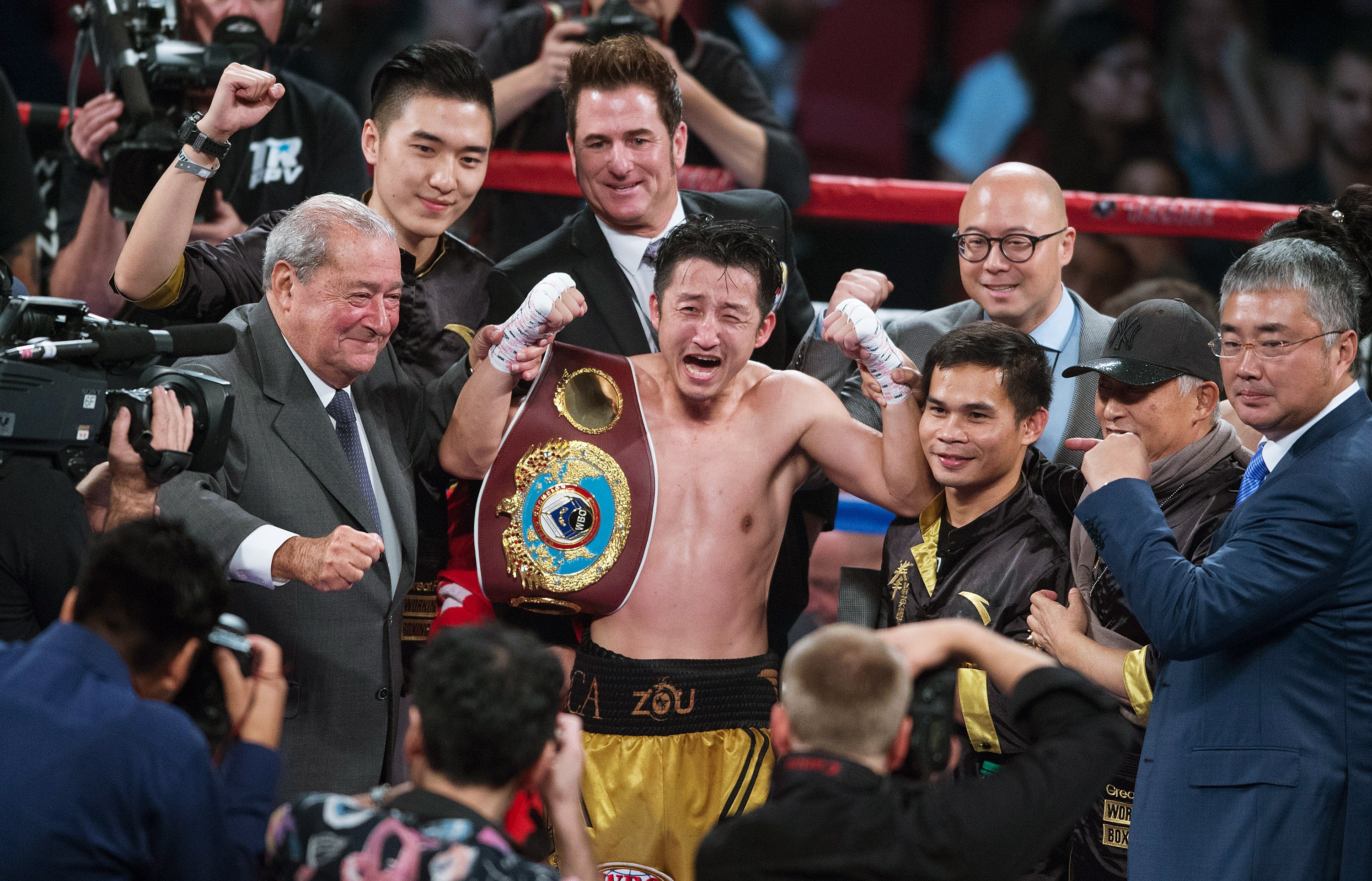 Zou Shiming celebrates his victory over Thailand’s Prasitak Phaprom to lift the WBO flyweight title in Las Vegas last November. Photo: Xinhua