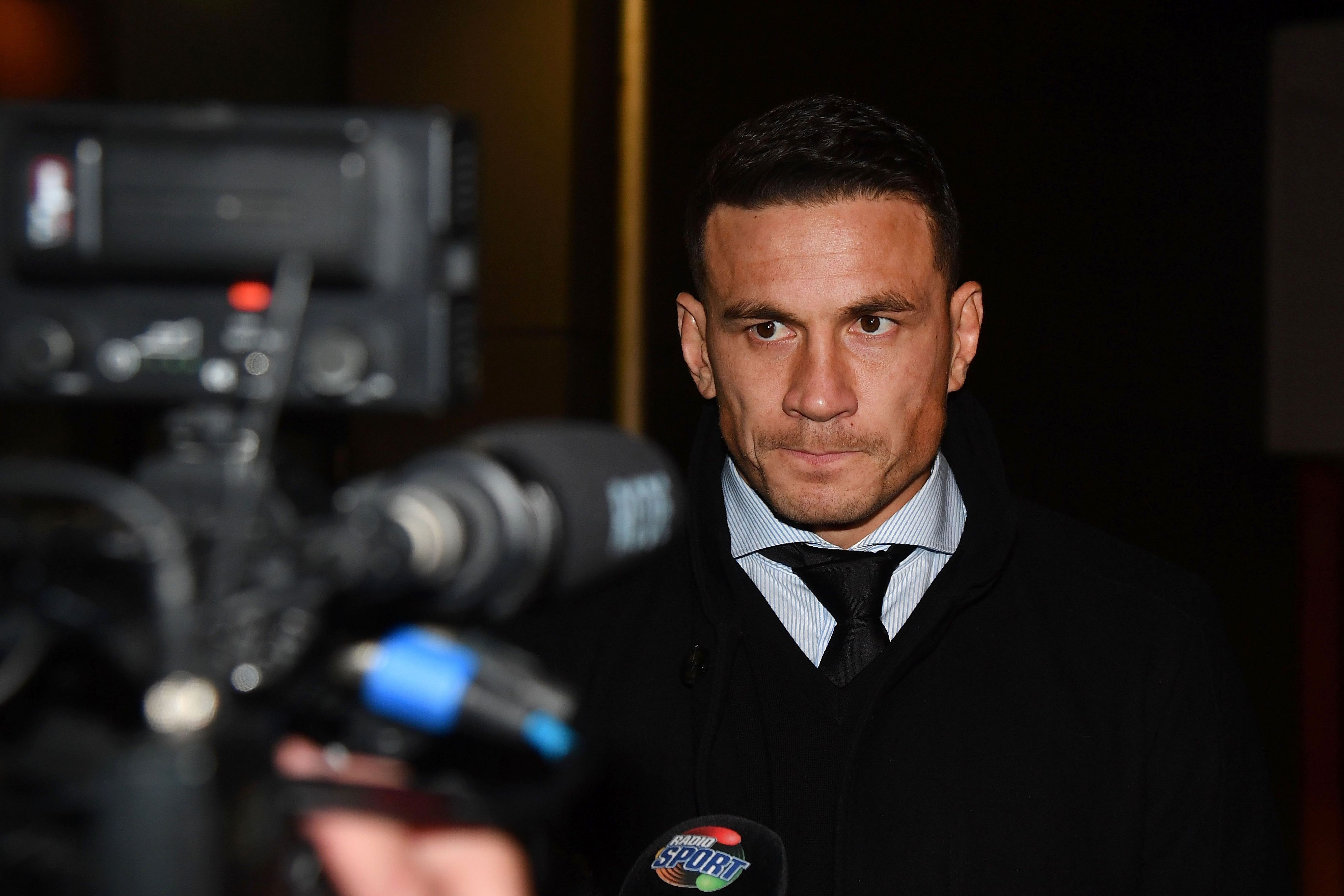 Sonny Bill Williams speaks to the media outside the NZRU Headquarters after his judicial hearing in Wellington. Photo: AFP