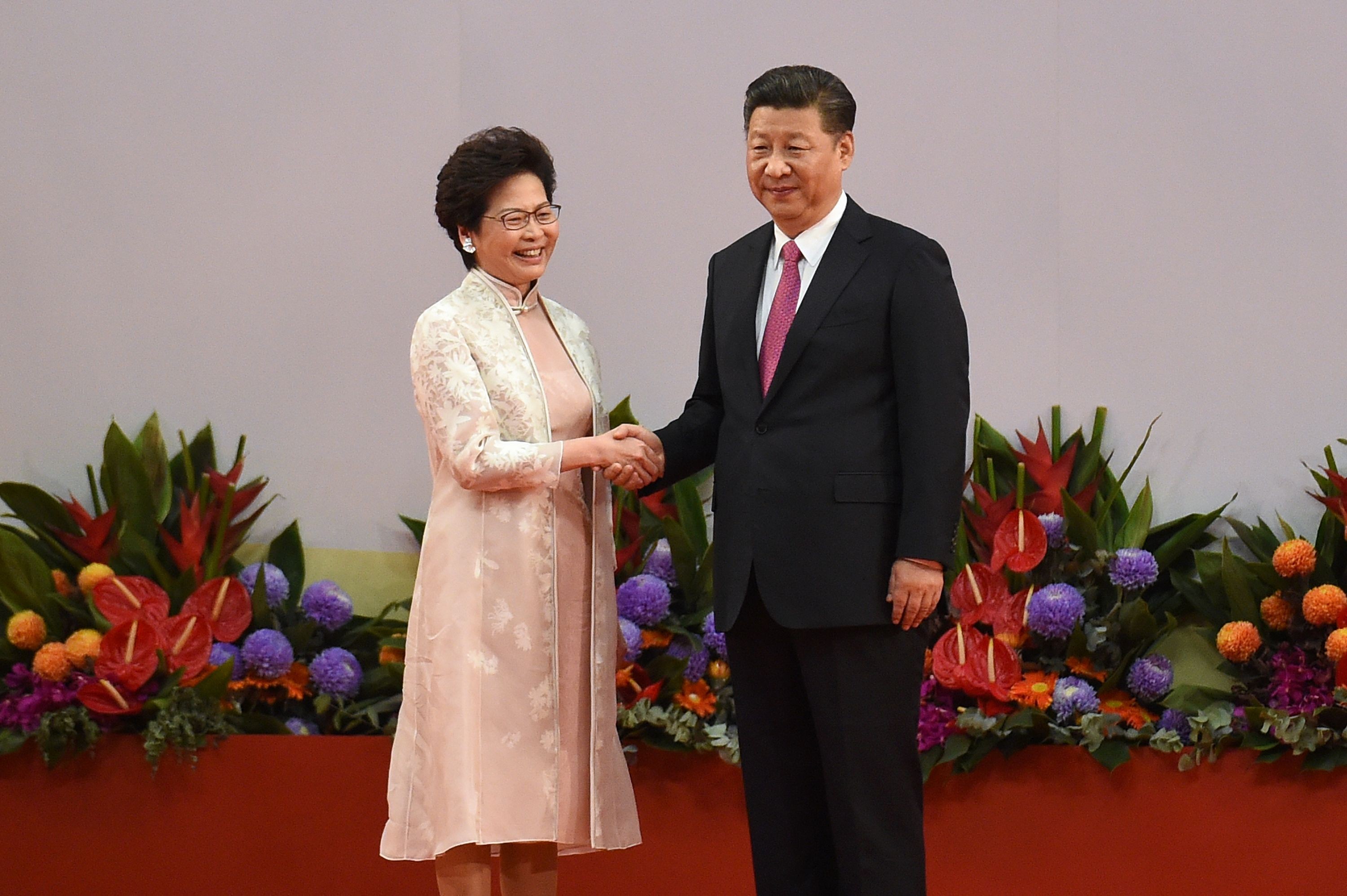 President Xi Jinping shakes hands with Carrie Lam, Hong Kong’s new chief executive. Photo: AFP