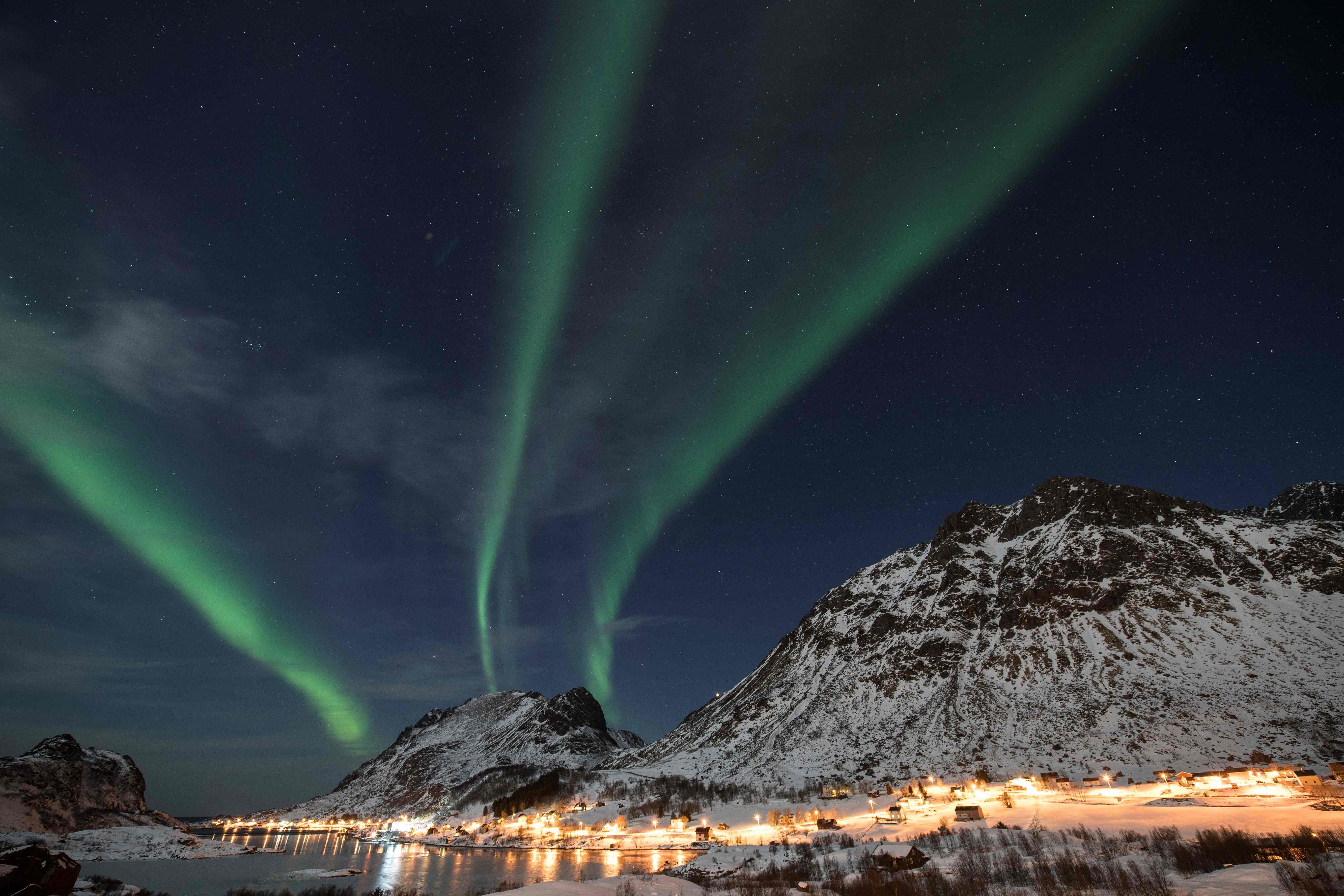 The “Northern Lights”, also known as “Aurora borealis” flash across the sky above Unstad in Norway, a town know for being the world's most northern Arctic surf school. AFP