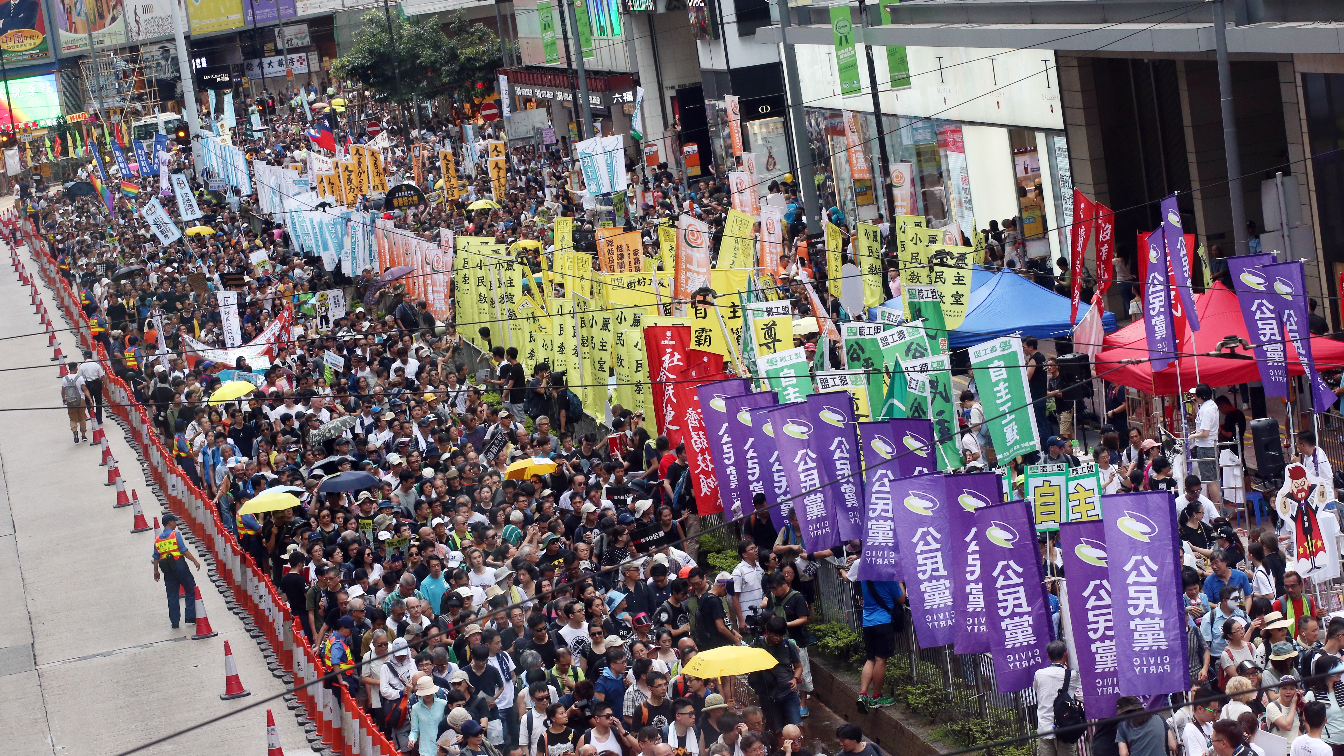 The July 1 march. The organiser said 60,000 people took part. Photo: David Wong