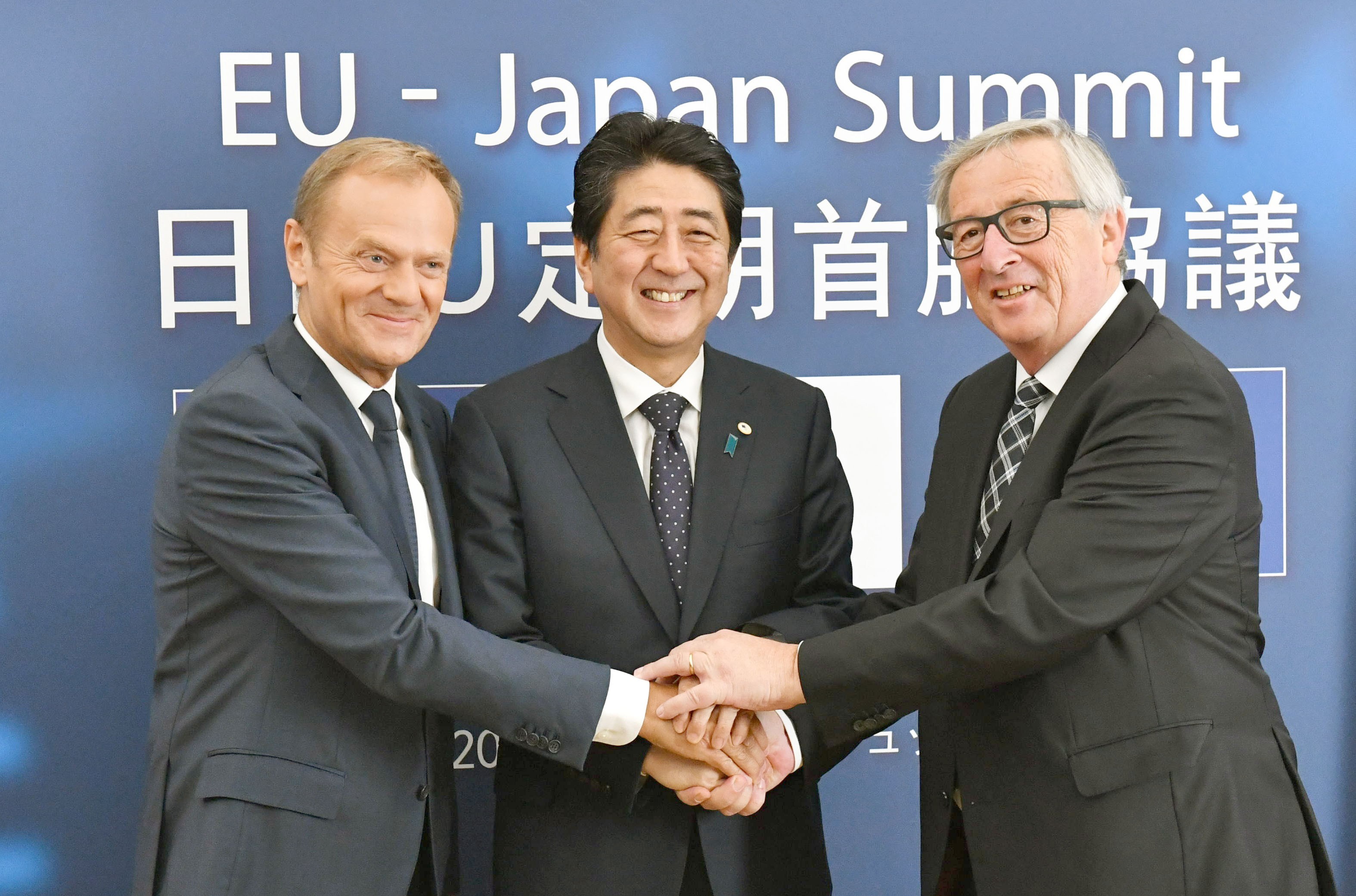 Japanese Prime Minister Shinzo Abe with European Council President Donald Tusk (left) and Jean-Claude Junker, president of the European Commission, before talks in Brussels on July 6. Japan and the European Union later announced a broad agreement on a free trade deal. Photo: Kyodo