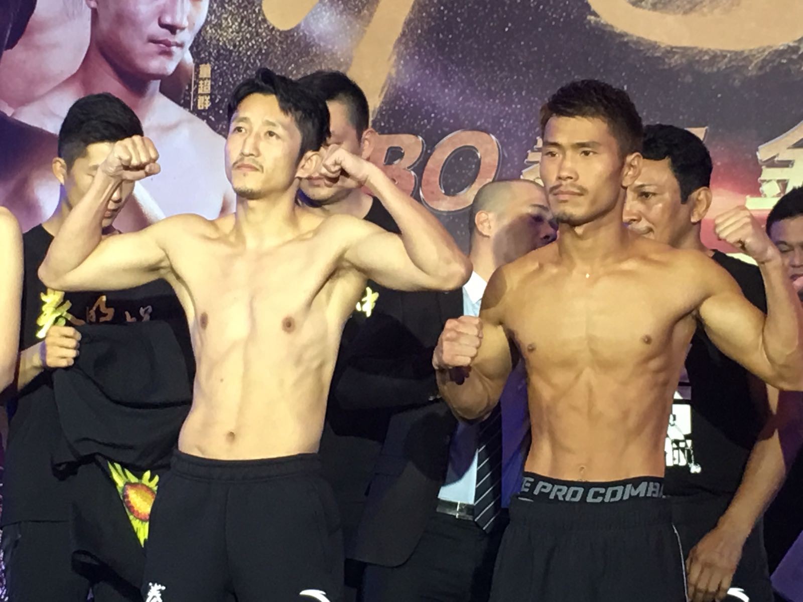 China's Zou Shiming and Japan's Sho Kimura at the weigh-in for their WBO title fight in Shanghai. Photo: DEF Promotions