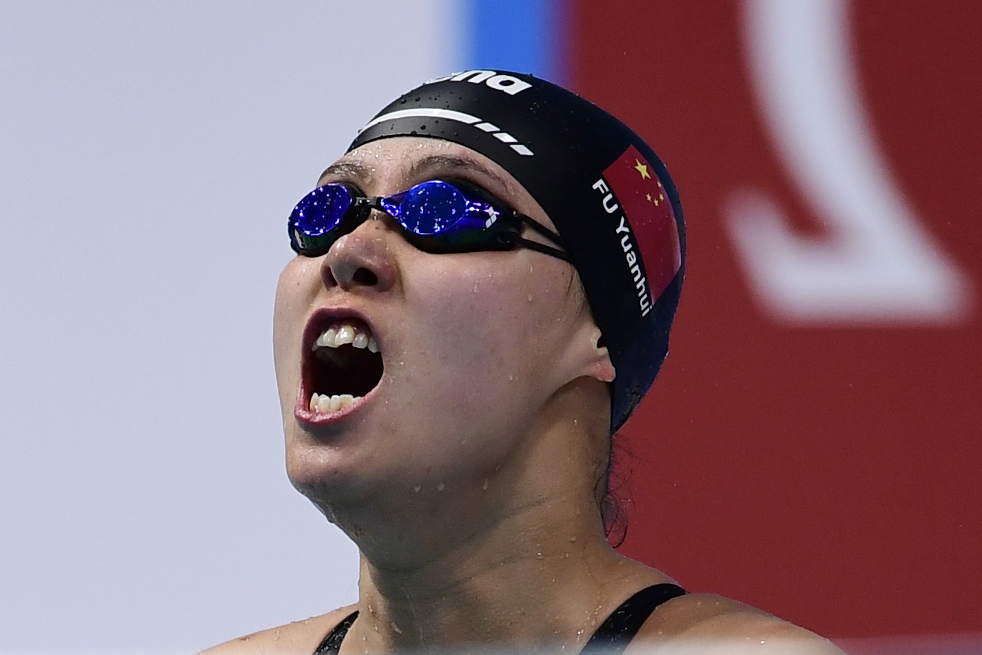 China's Fu Yuanhui reacts after competing in the women's 50 metre backstroke final. Photo: AFP