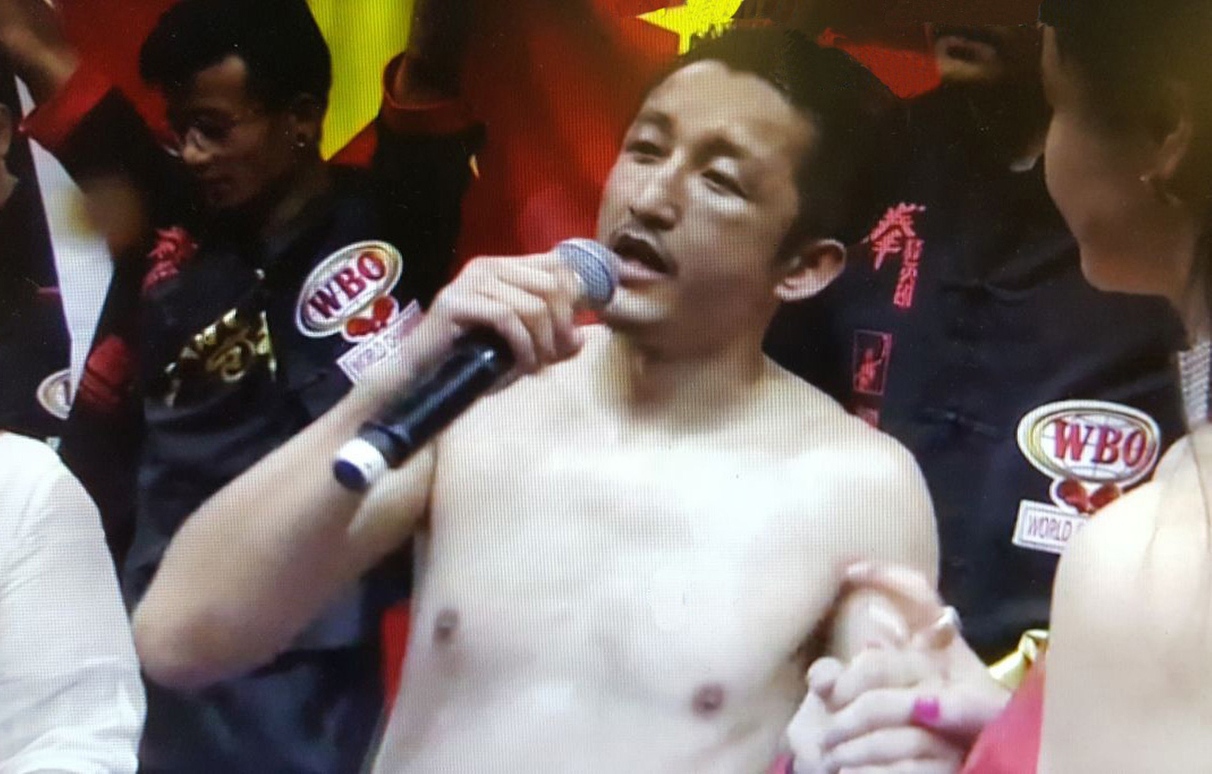 China's Zou Shiming speaks to the audience after losing his WBO world title fight in Shanghai. Photo: Handout