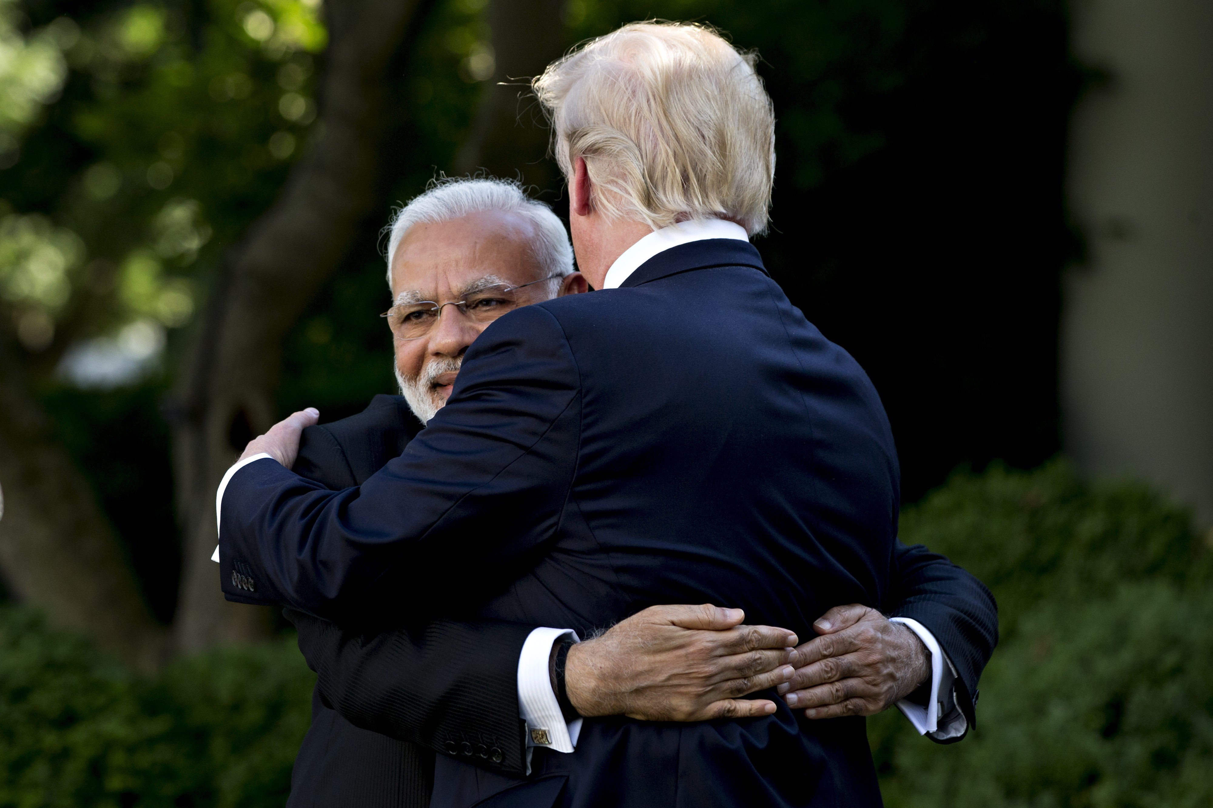 Narendra Modi, India's prime minister, left, embraces US President Donald Trump during a joint statement in the Rose Garden of the White House in Washington in June. Photo: Bloomberg