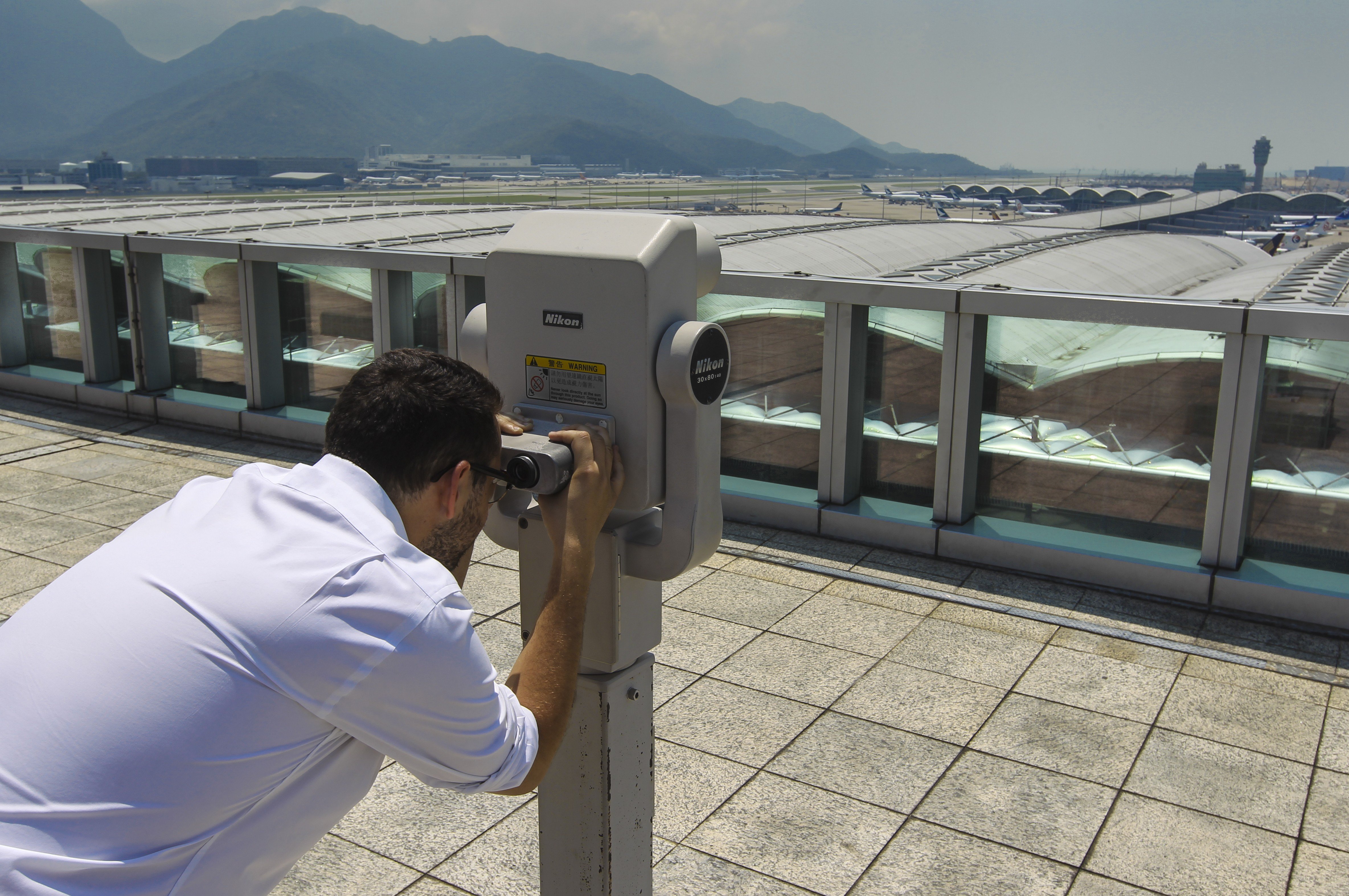Hong Kong airport’s Aviation Discovery Centre includes an outdoor sky deck where you can watch the action on the runway with binoculars. Photo: Edward Wong