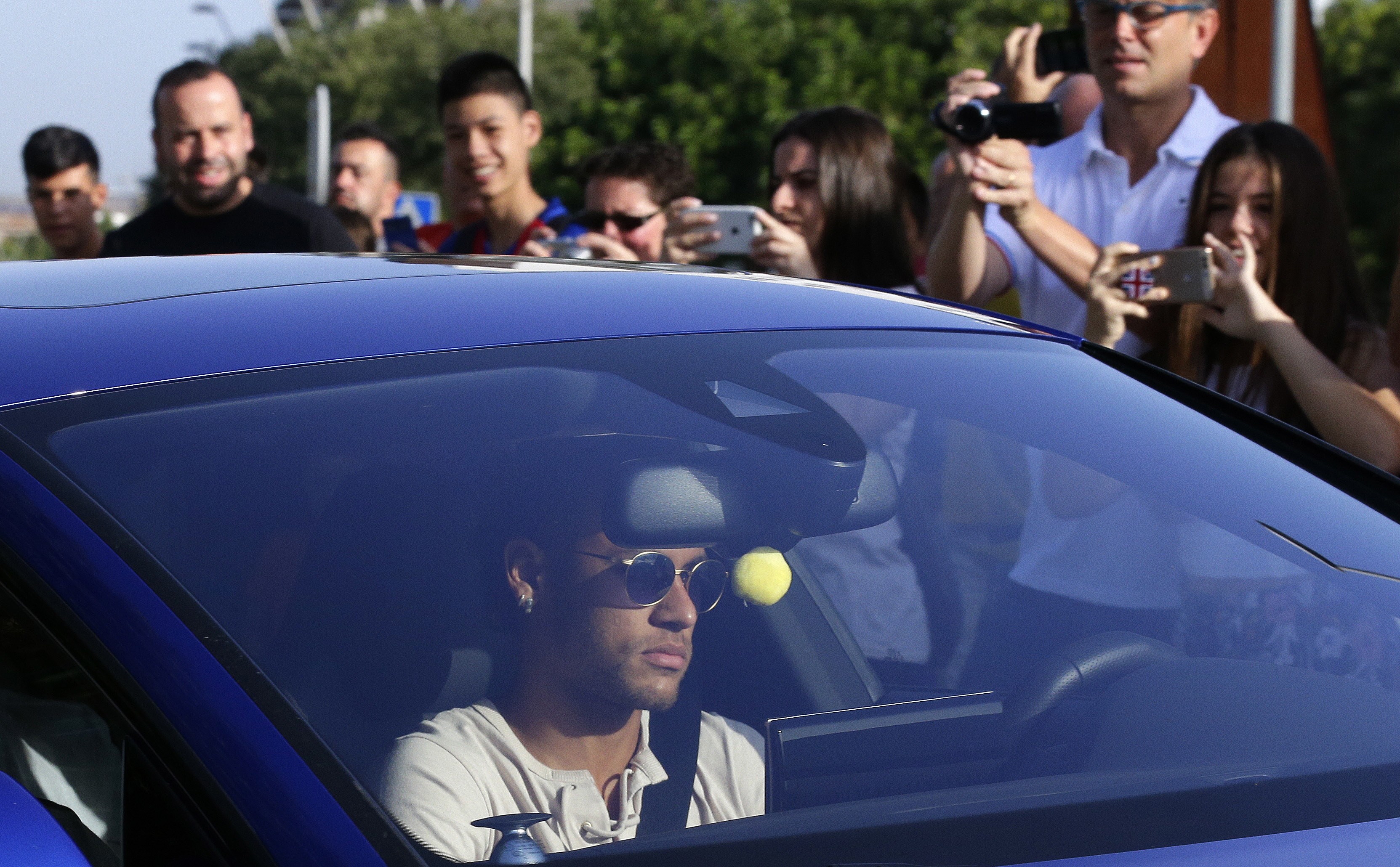 Neymar arrives for training. Photo: AP