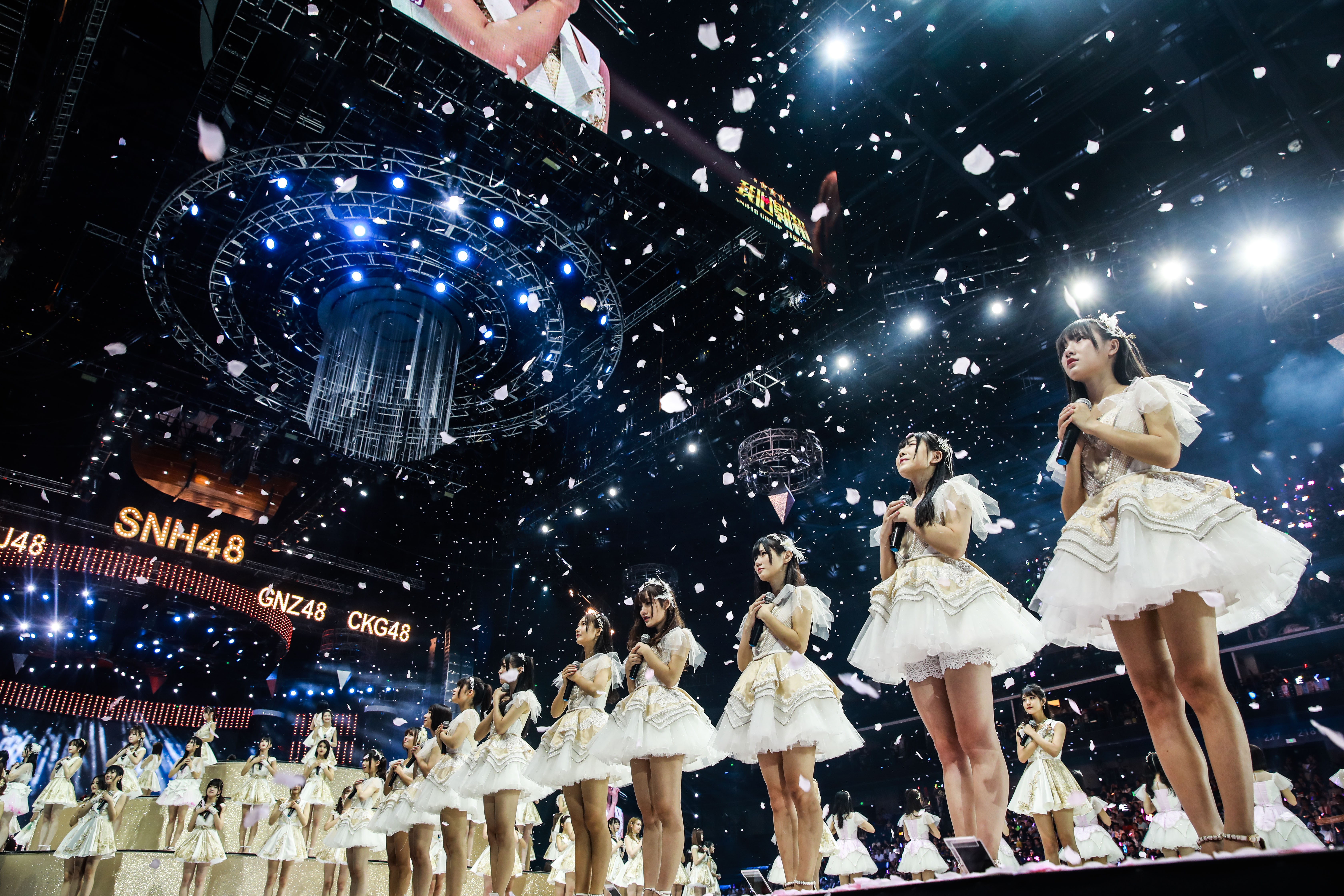 Young idol hopefuls take part in the SNH48 concert and elections at Shanghai’s Mercedes-Benz Arena on July 28. Photo: SNH48 Group