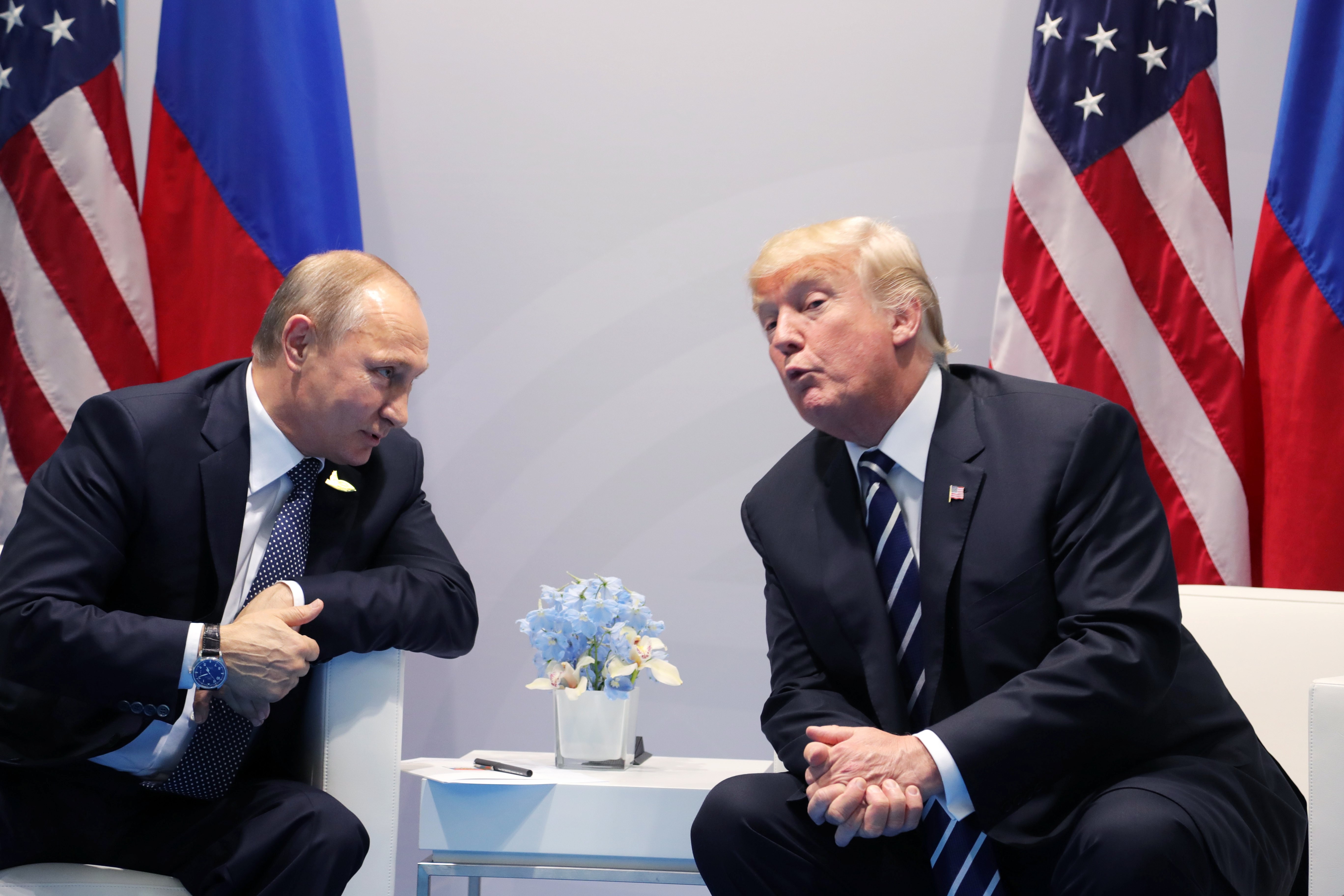 US President Donald Trump and Russian President Vladimir Putin meet on the sidelines of the G20 summit in Hamburg, on July 7. Alleged Russian interference in the 2016 US presidential election is just one of the controversies to have rocked the Trump administration. Photo: EPA