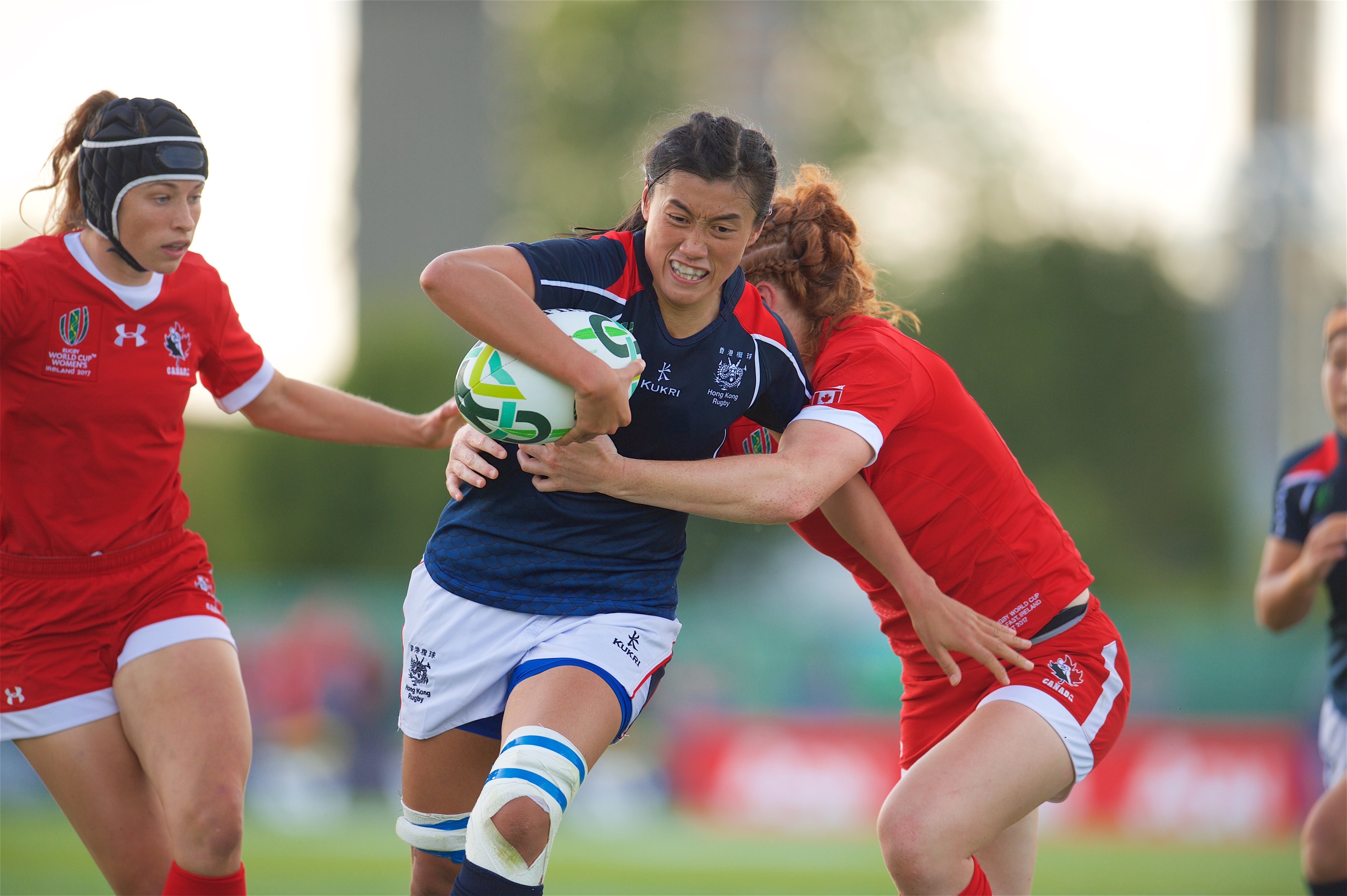 Hong Kong captain Chow Mei-nam in action against Canada. Photos: HKRU