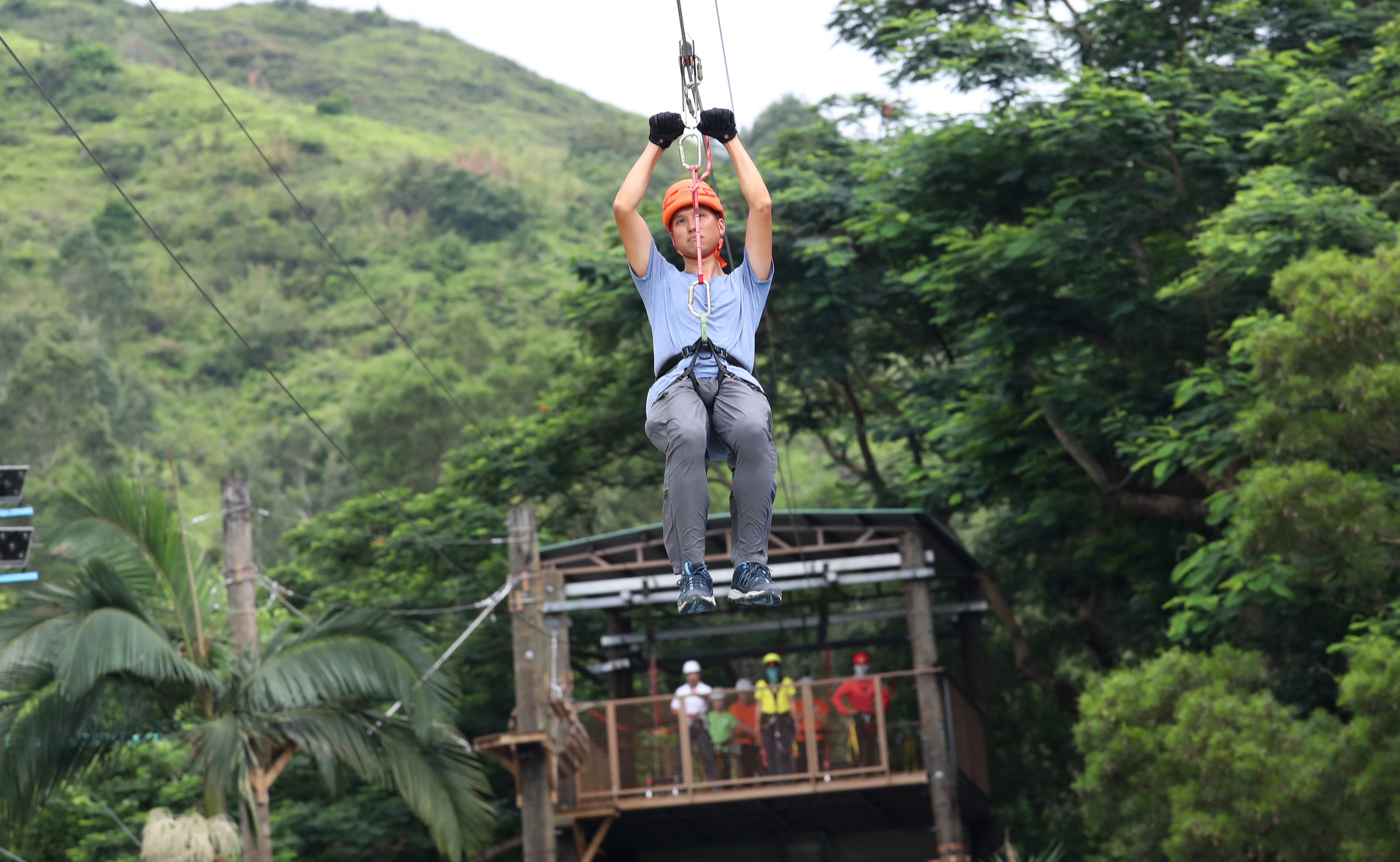 A youngster takes to the zipline at the training camp in Pat Heung. Photo: Nora Tam