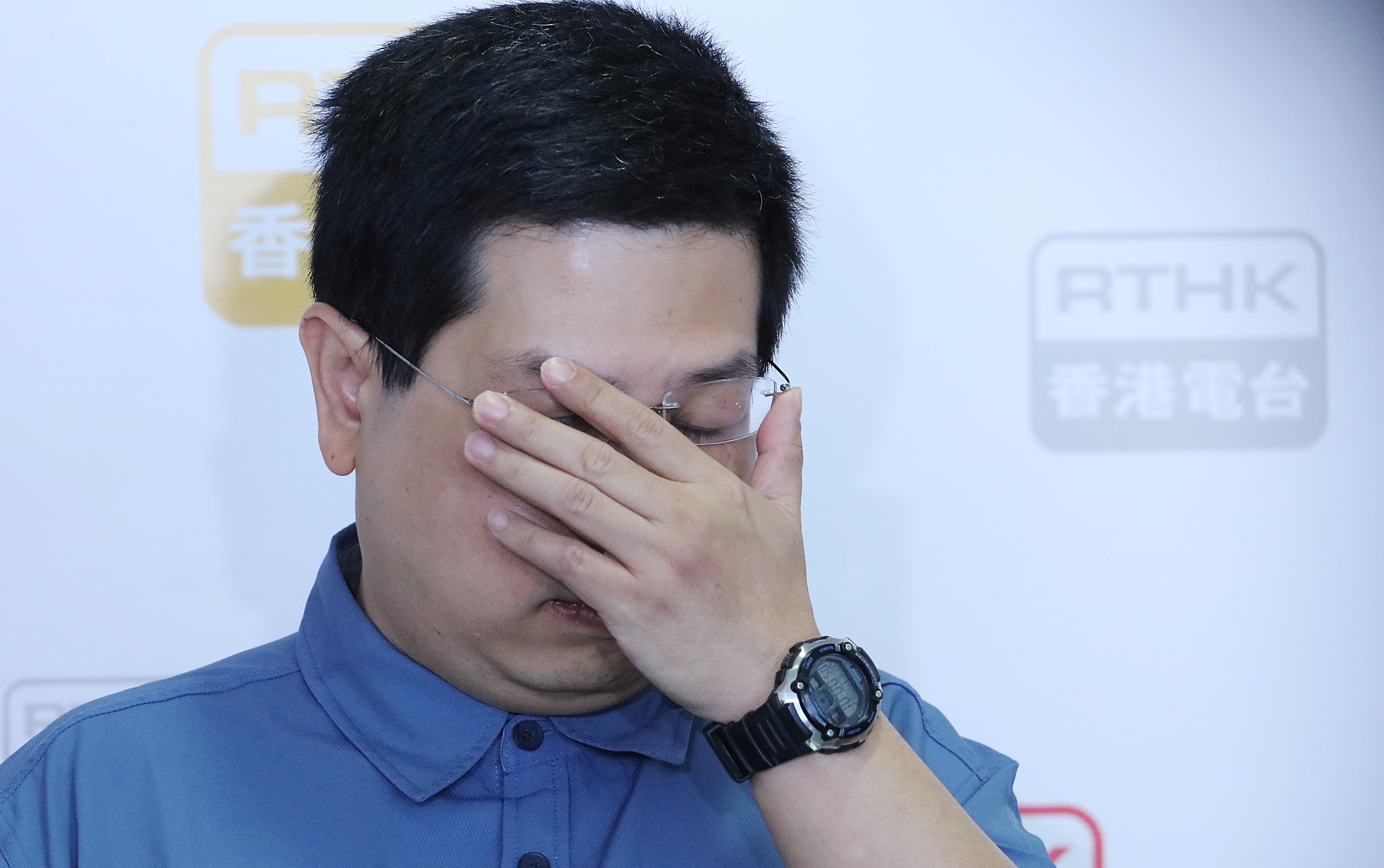 Democratic Party member Howard Lam Tsz-kin attends a radio programme at RTHK in Kowloon Tong after making public his claims for abduction and torture by mainland agents. Photo: Felix Wong